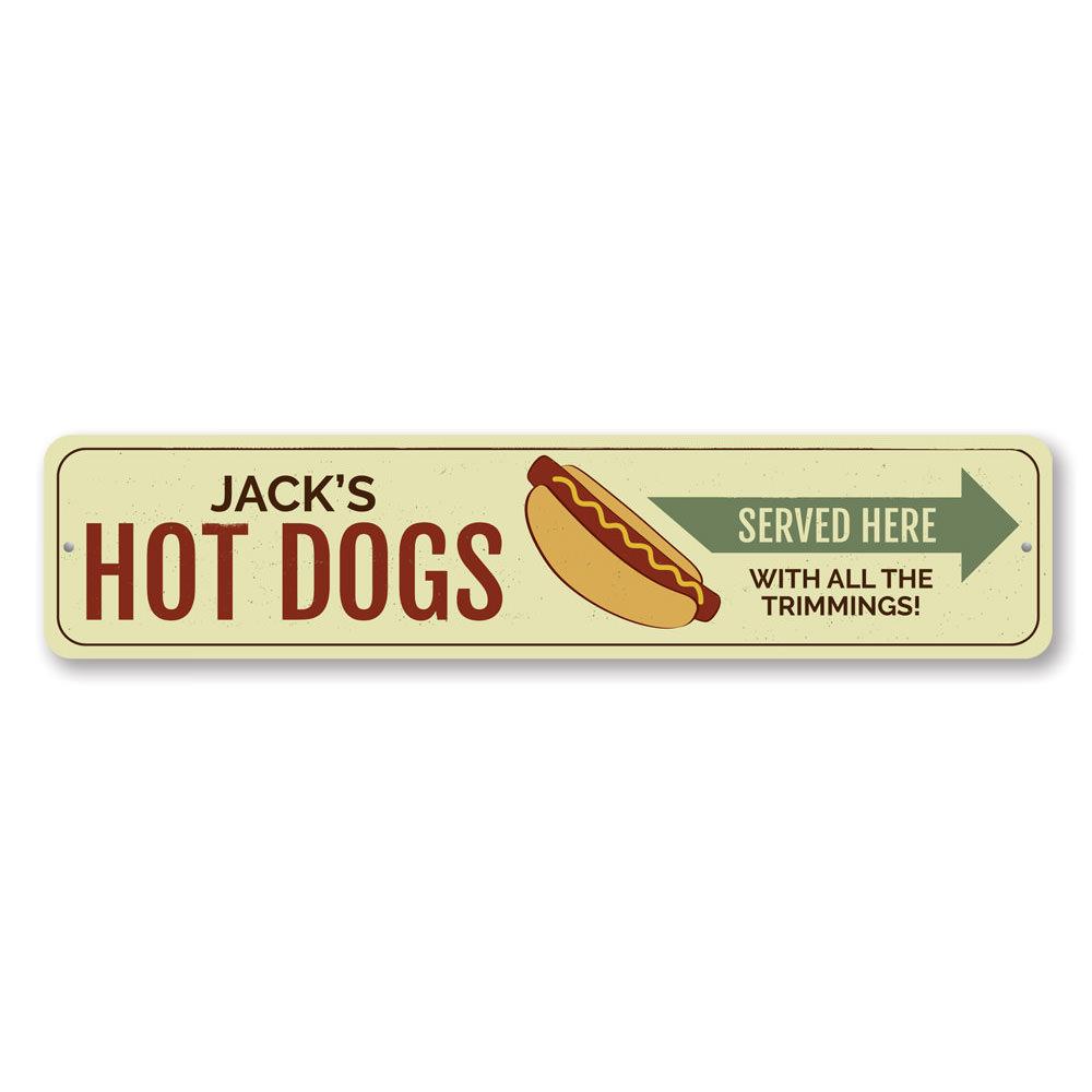 A vibrant aluminum sign reading 'Hot Dogs Served Here', perfect for restaurants and cafes, showcasing quality craftsmanship.