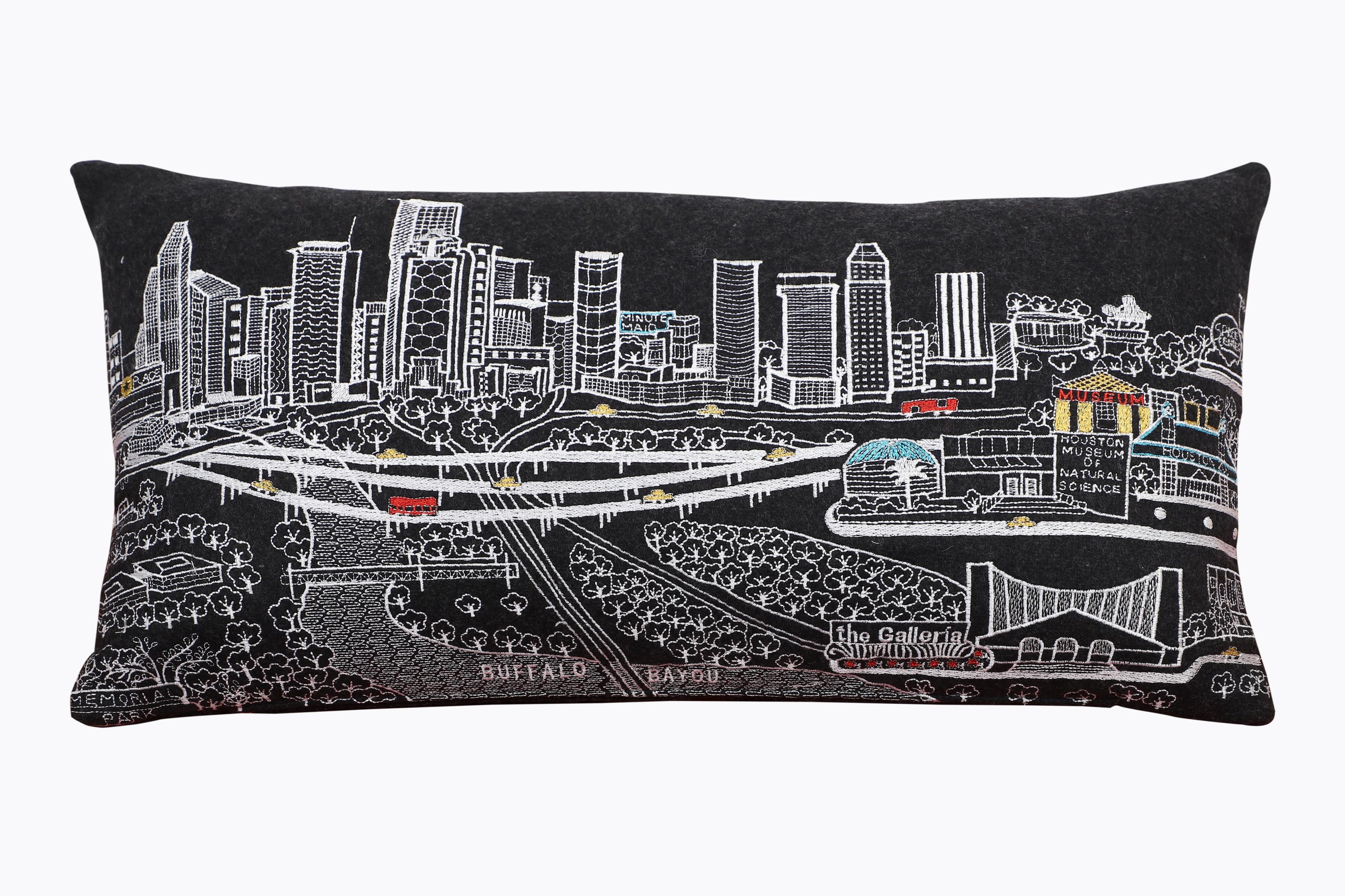 Houston Pillow featuring a vibrant design inspired by the city, with a red zipper at the bottom and made from wool and nylon blend.