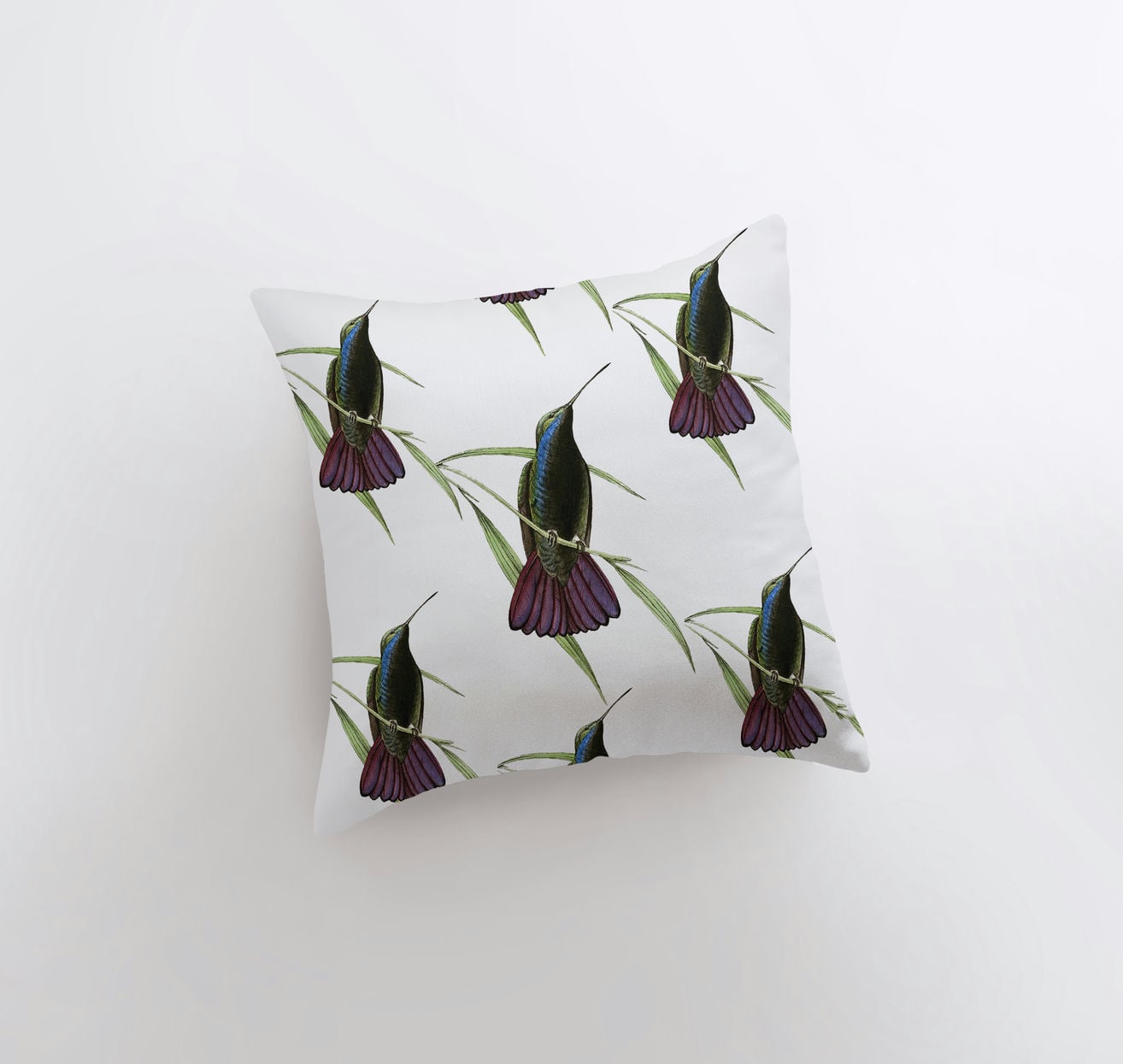 A beautifully designed Humming Bird Pillow Cover featuring a vibrant repeat pattern of hummingbirds, perfect for bird lovers and home decor.