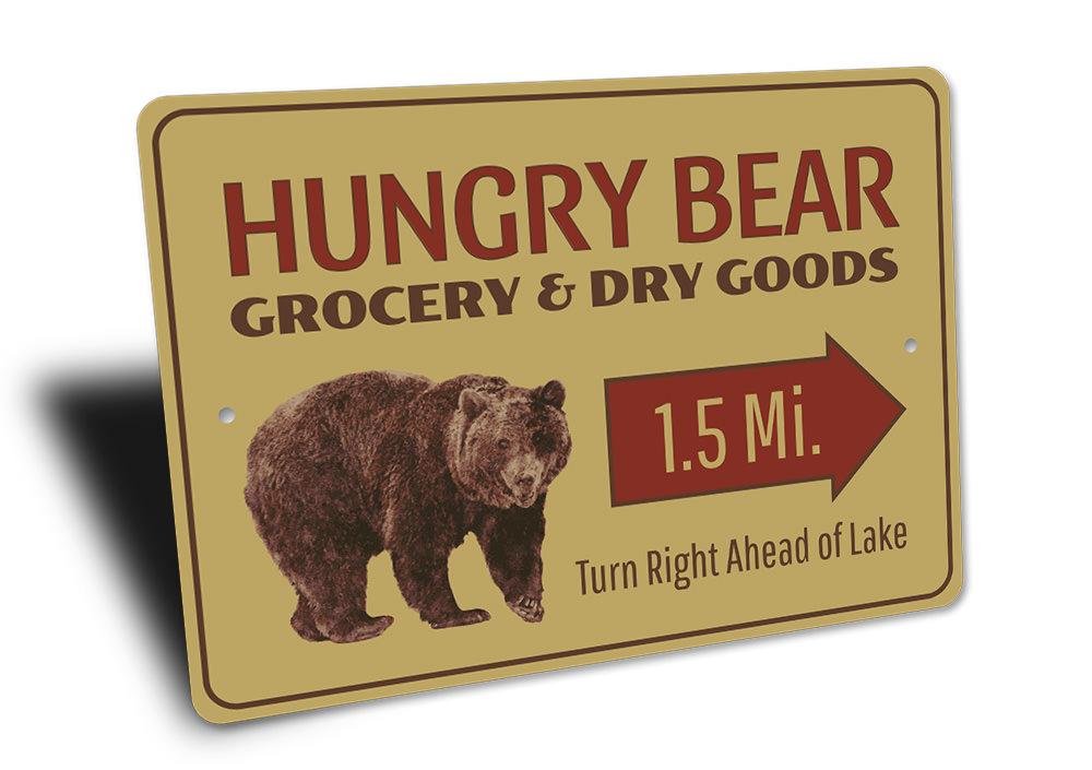 Hungry Bear Sign featuring a bear design, crafted from high-quality aluminum, perfect for lakehouse decor.