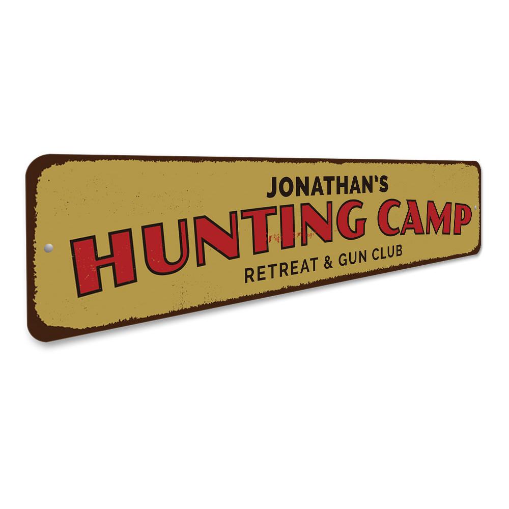 A beautifully crafted Hunting Camp Retreat Sign made of high-quality aluminum, featuring customizable text and pre-drilled holes for easy mounting.