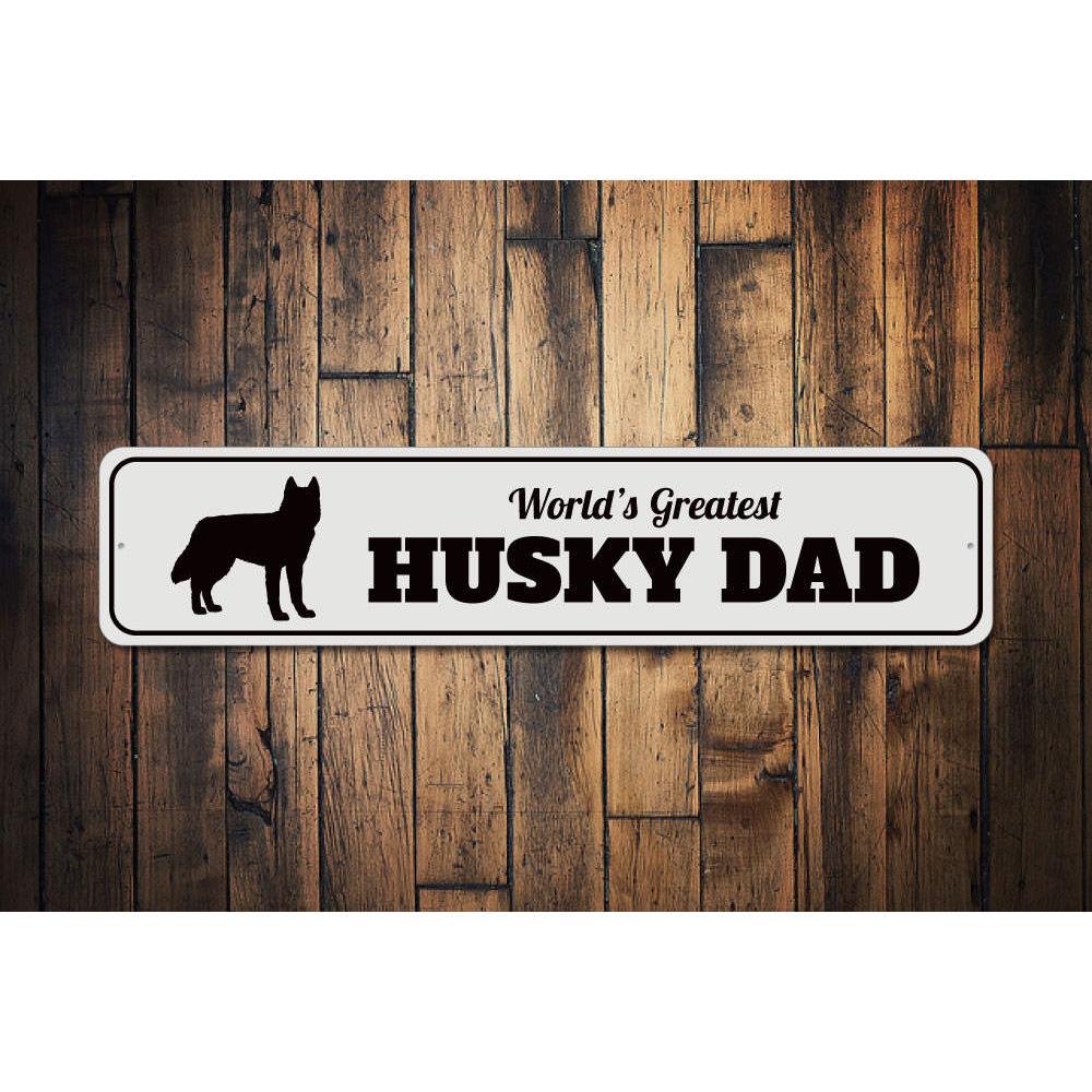 A decorative Husky Dad Sign made of aluminum, featuring a playful design that celebrates husky dog lovers and fathers.