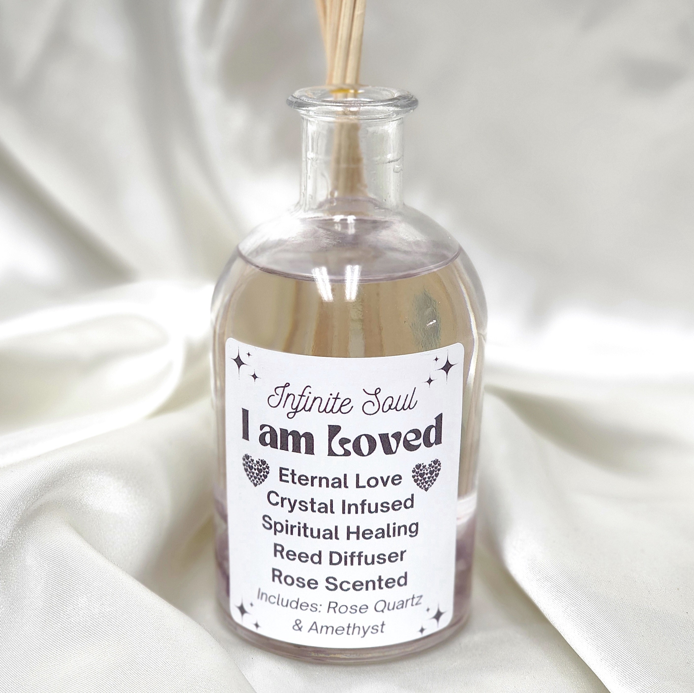 I am Loved Eternal Love Crystal Infused Reed Diffuser with Rose scent, featuring crystal infusion and eco-friendly design.