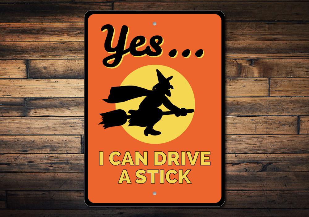 I Can Drive A Stick Sign made of high-quality aluminum, featuring spooky Halloween-themed design, perfect for indoor or outdoor decoration.