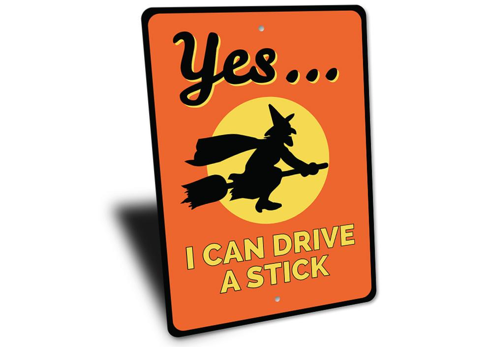 I Can Drive A Stick Sign made of high-quality aluminum, featuring spooky Halloween-themed design, perfect for indoor or outdoor decoration.