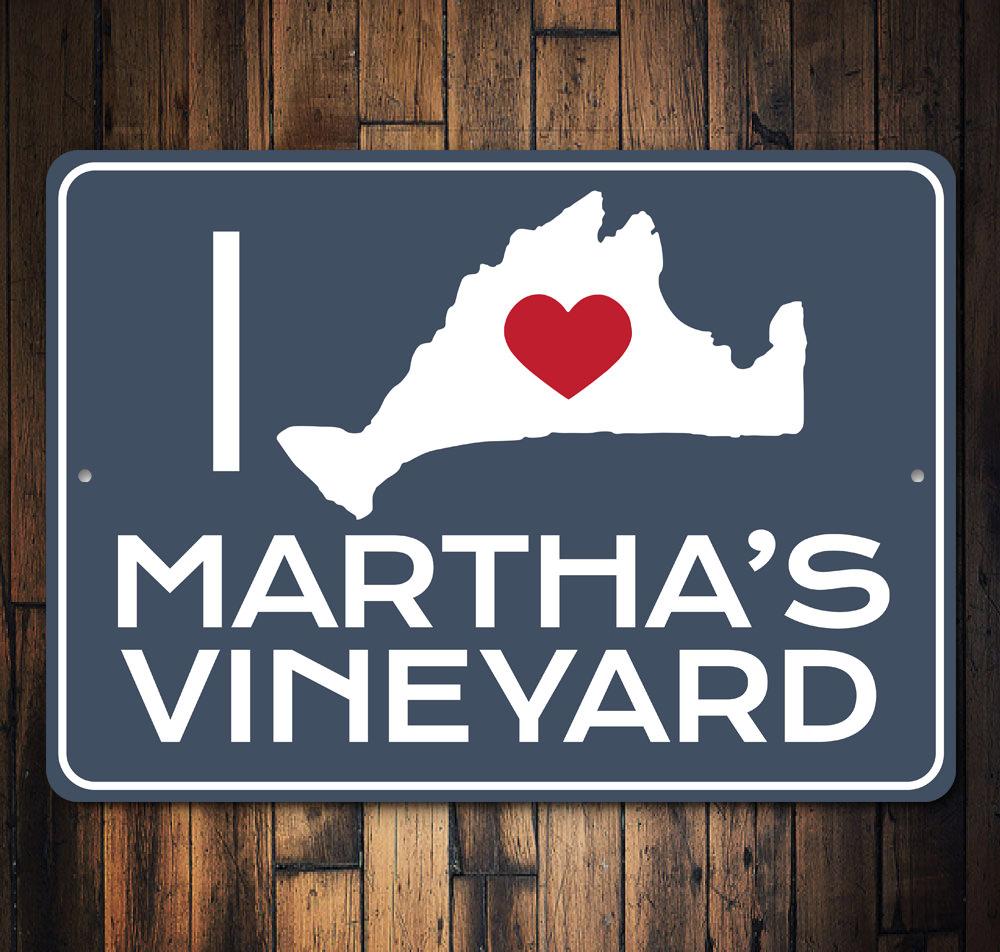 A decorative I Love Martha's Vineyard sign made of durable aluminum, featuring vibrant colors and a coastal design, perfect for beach-themed decor.