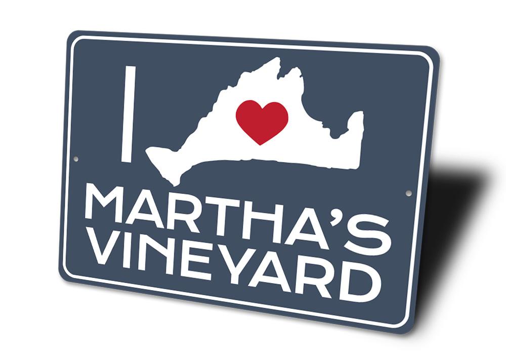 A decorative I Love Martha's Vineyard sign made of durable aluminum, featuring vibrant colors and a coastal design, perfect for beach-themed decor.