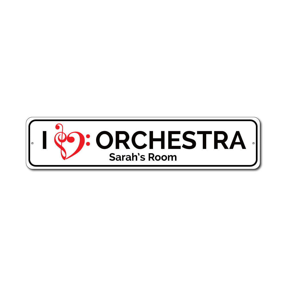 A decorative I Love Orchestra Sign made of high-quality aluminum, featuring vibrant colors and a musical theme, perfect for wall decor.