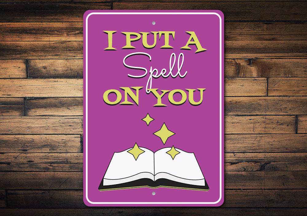 A decorative 'I Put a Spell on You' sign made of high-quality aluminum, featuring spooky Halloween-themed design, perfect for home decor.