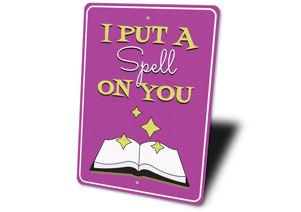 A decorative 'I Put a Spell on You' sign made of high-quality aluminum, featuring spooky Halloween-themed design, perfect for home decor.