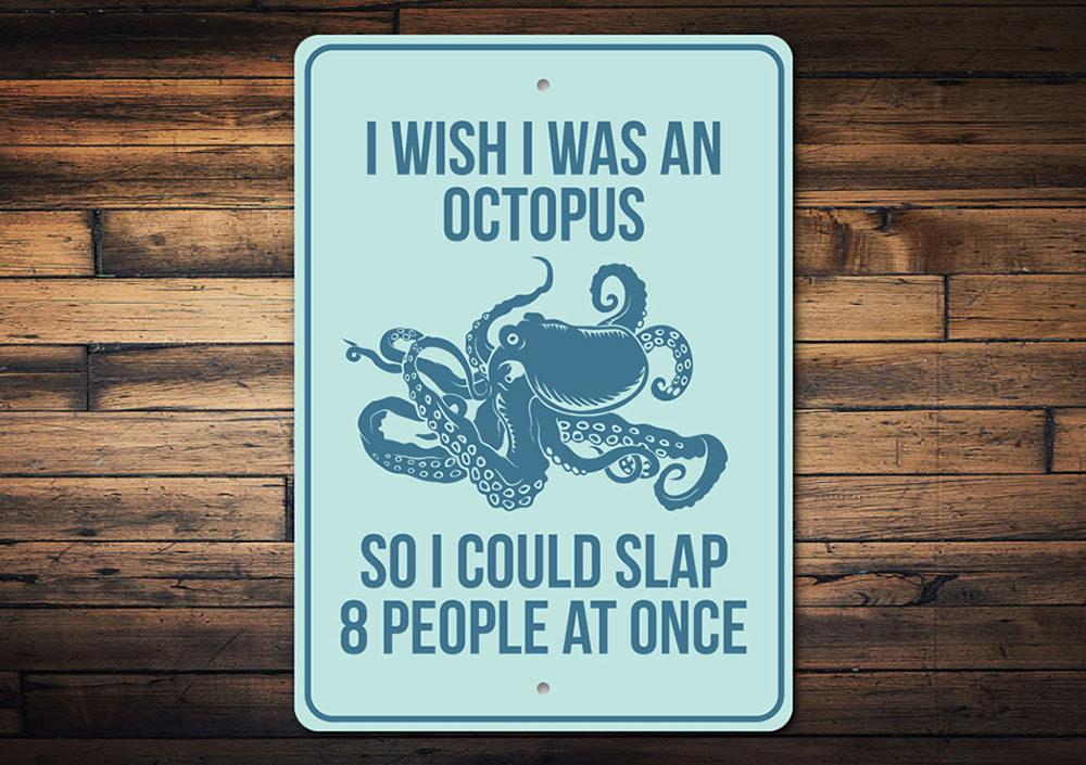 A humorous beach house sign featuring an octopus design with the text 'I Wish I was an Octopus', made from durable aluminum.