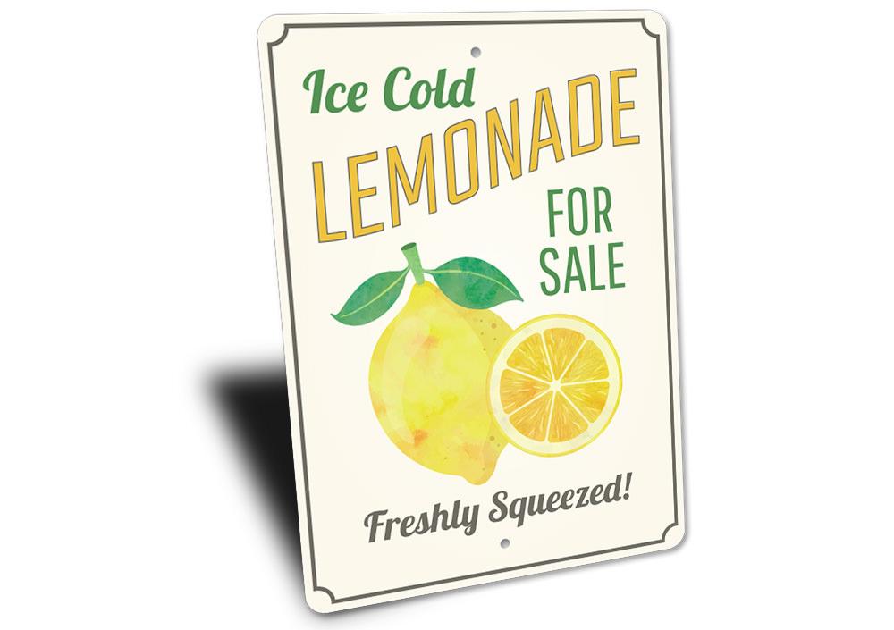 A vibrant Ice Cold Lemonade Sign made of aluminum, featuring bright colors and a refreshing lemonade design, perfect for cafes and restaurants.