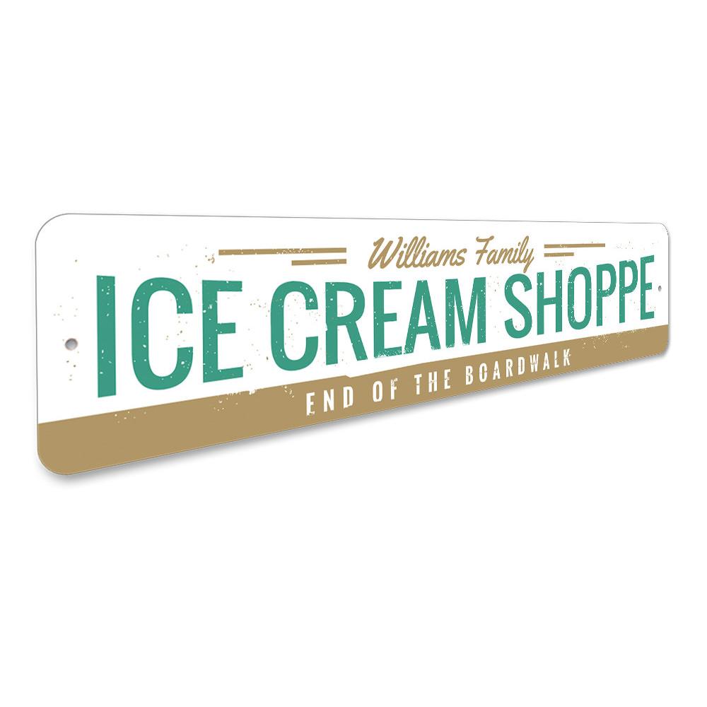 A vibrant Ice Cream Shoppe Sign made of durable aluminum, featuring customizable text and pre-drilled holes for easy mounting.