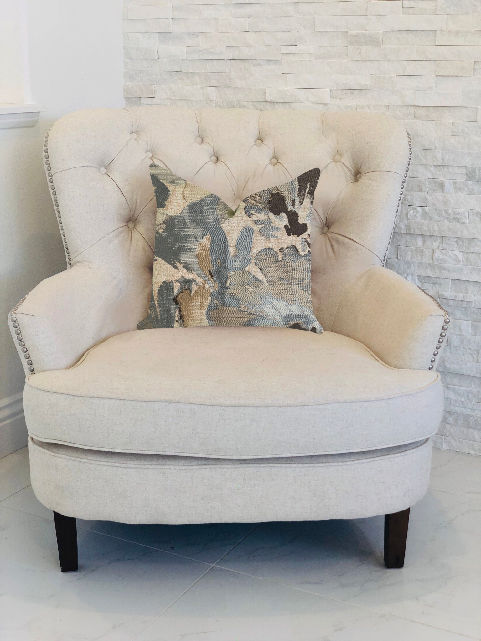 Icy Blue Wildflower Luxury Throw Pillow featuring a floral design in blue and beige, handmade in the USA with a soft fabric blend.