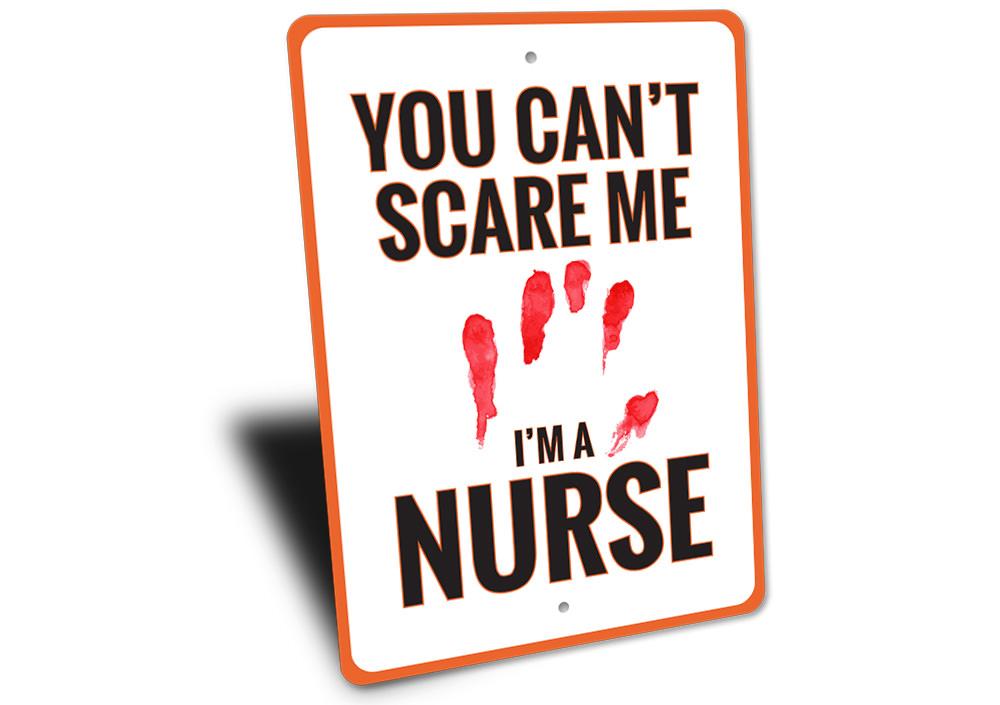 A decorative 'I'm a Nurse' sign made of high-quality aluminum, featuring spooky Halloween-themed design elements, perfect for home decor.