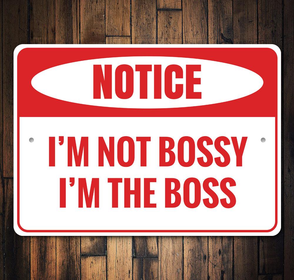 A decorative 'I'm the Boss' sign made of high-quality aluminum, featuring bold lettering and a stylish design, perfect for home or office decor.