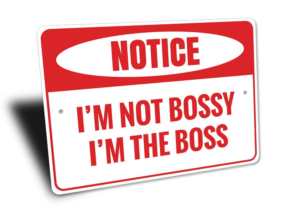 A decorative 'I'm the Boss' sign made of high-quality aluminum, featuring bold lettering and a stylish design, perfect for home or office decor.