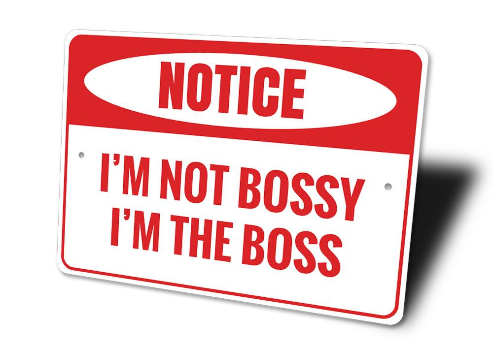 A decorative 'I'm the Boss' sign made of high-quality aluminum, featuring bold lettering and a stylish design, perfect for home or office decor.