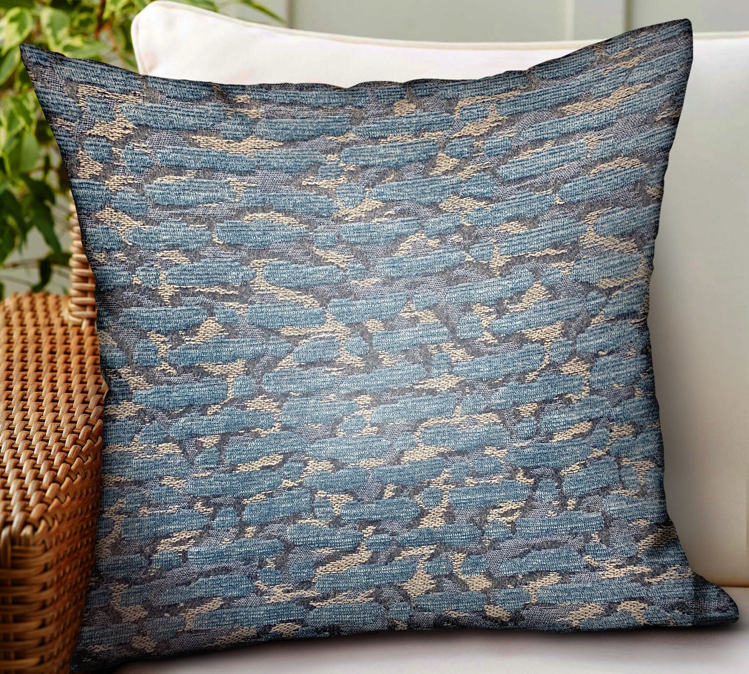 Indigo Rivulet Blue Solid Luxury Throw Pillow showcasing its vibrant blue color and durable Sunbrella fabric, perfect for indoor and outdoor use.