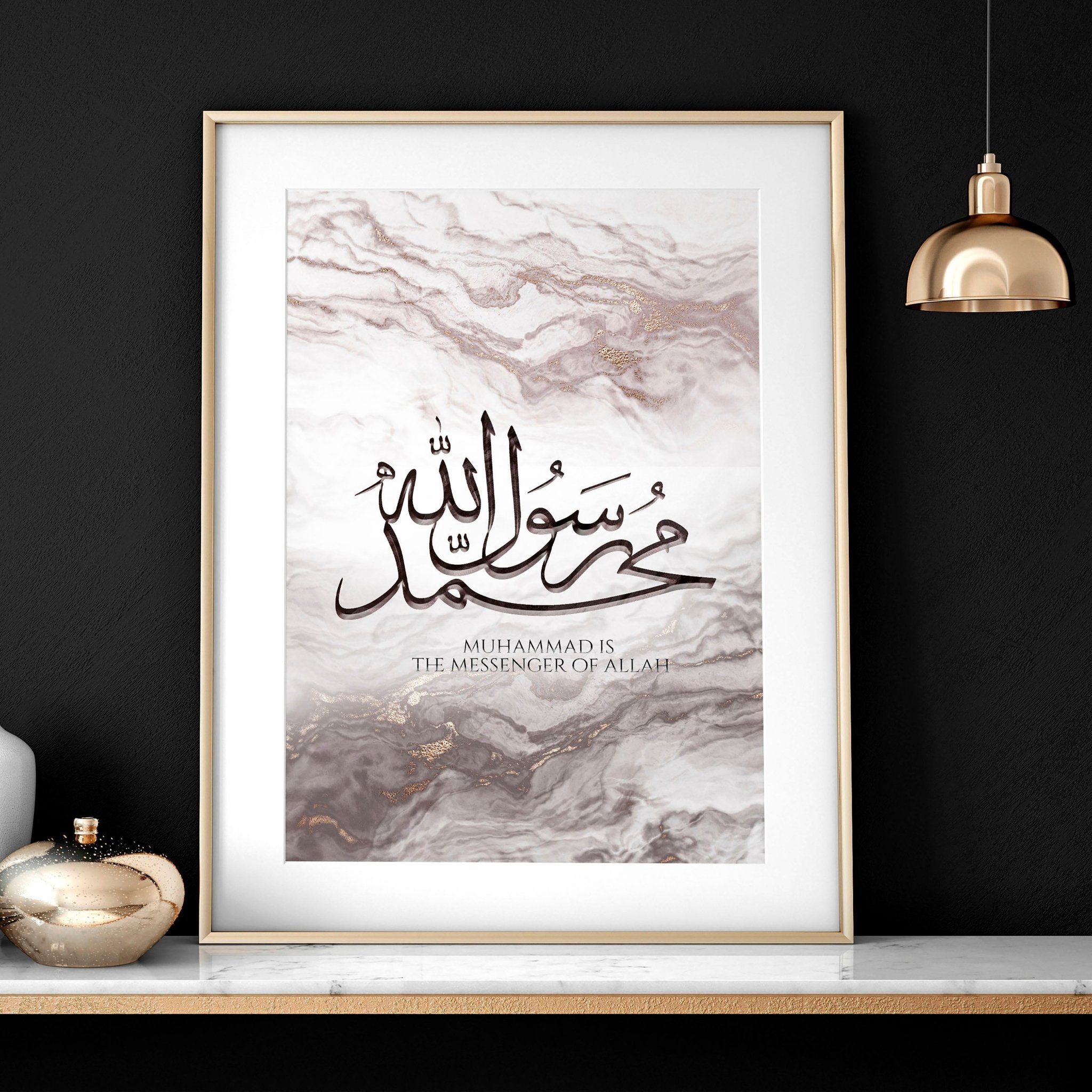 A beautiful Islamic wall art print featuring rose gold Arabic calligraphy on a maroon and muted pink abstract marble background.