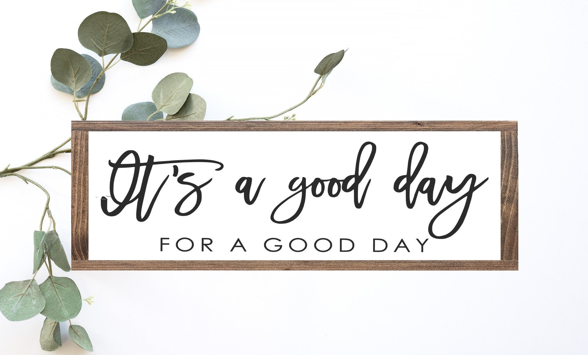 Handcrafted wood sign reading 'It's a Good Day For A Good Day' with a matte white background and unique wood grain.