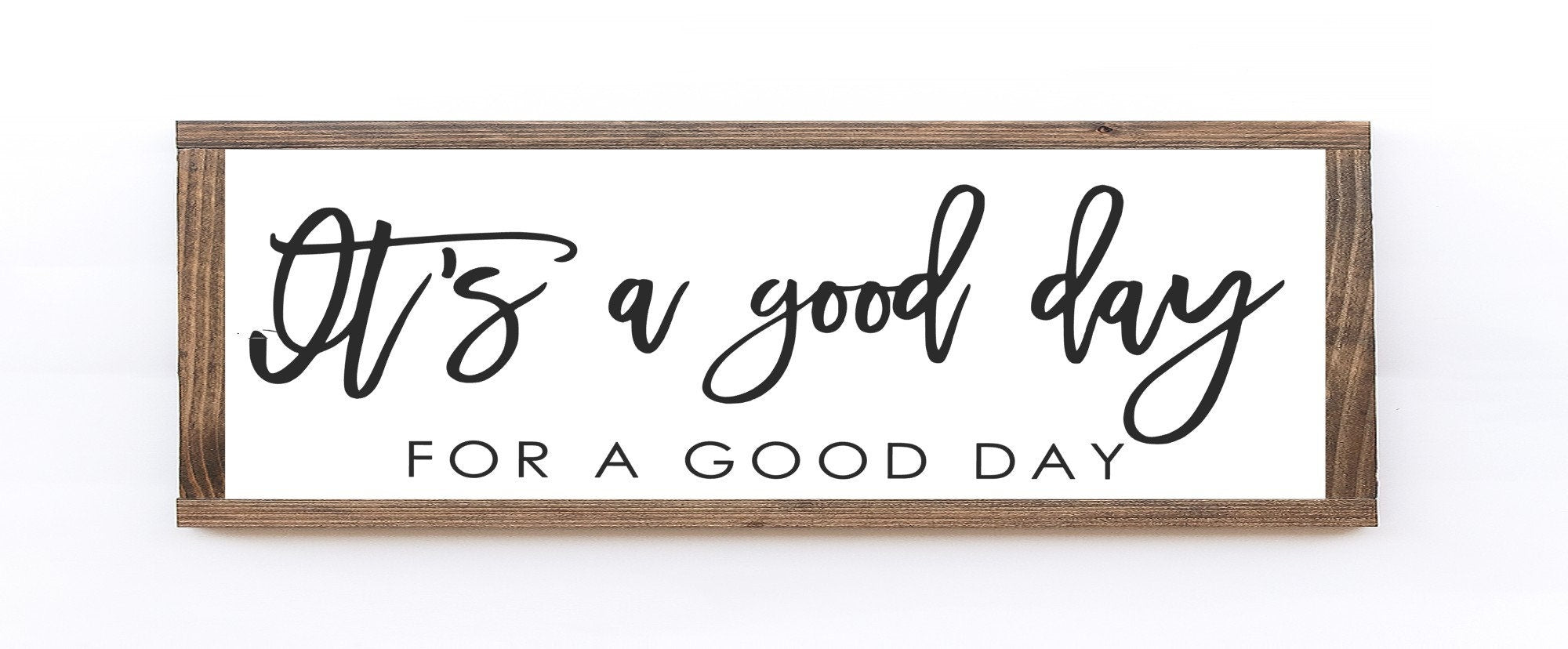 Handcrafted wood sign reading 'It's a Good Day For A Good Day' with a matte white background and unique wood grain.