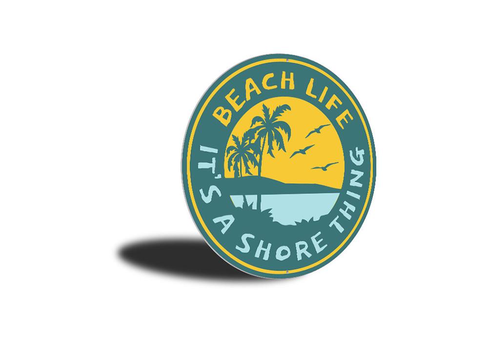 It's a Shore Thing Beach Sign made of high-quality aluminum, featuring a coastal design perfect for beach houses and outdoor decor.