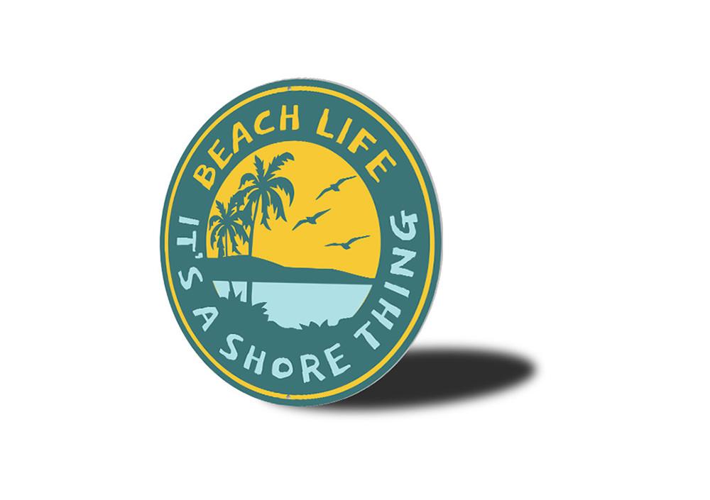 It's a Shore Thing Beach Sign made of high-quality aluminum, featuring a coastal design perfect for beach houses and outdoor decor.