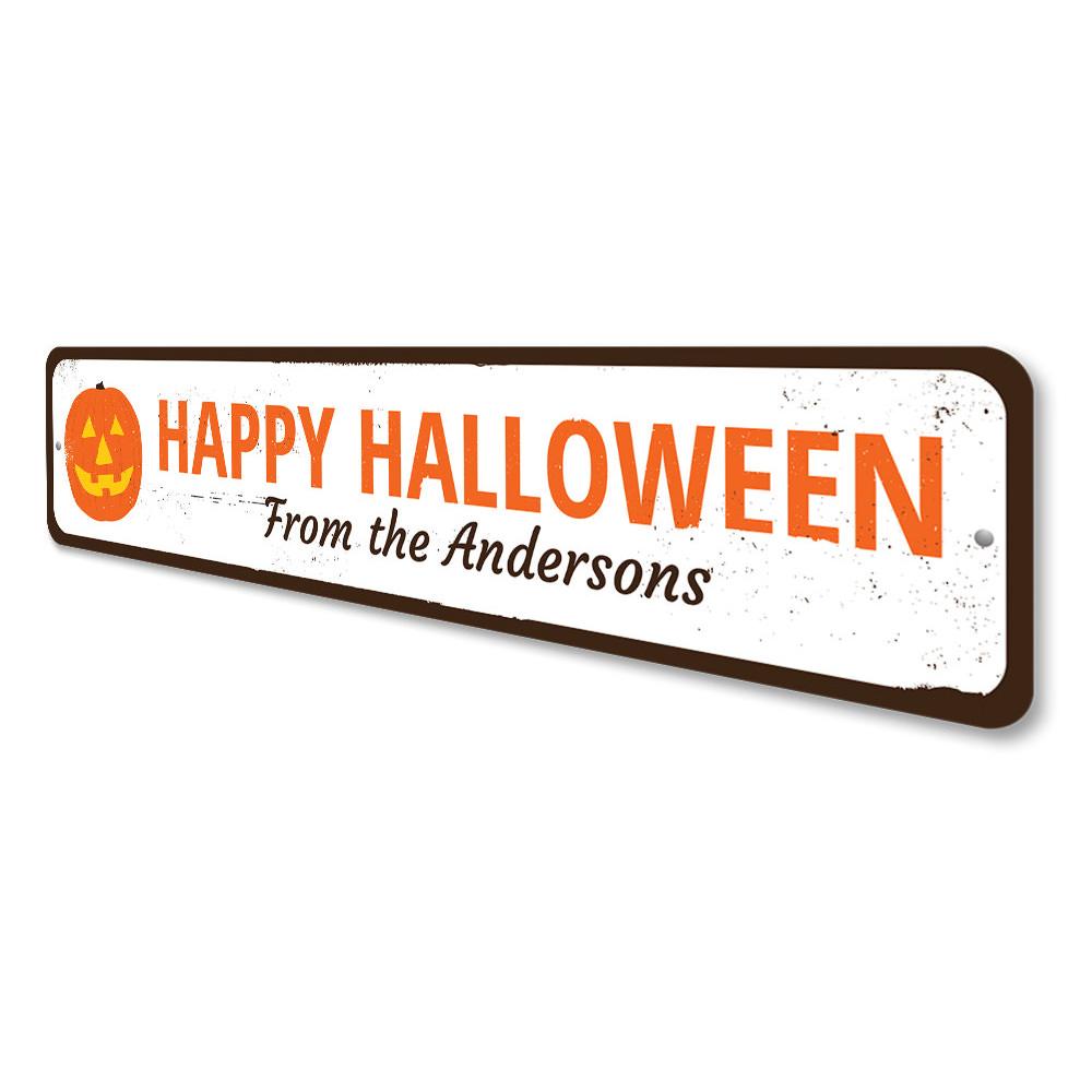 A decorative Jack-O-Lantern sign made of aluminum, featuring a spooky design perfect for Halloween decor.