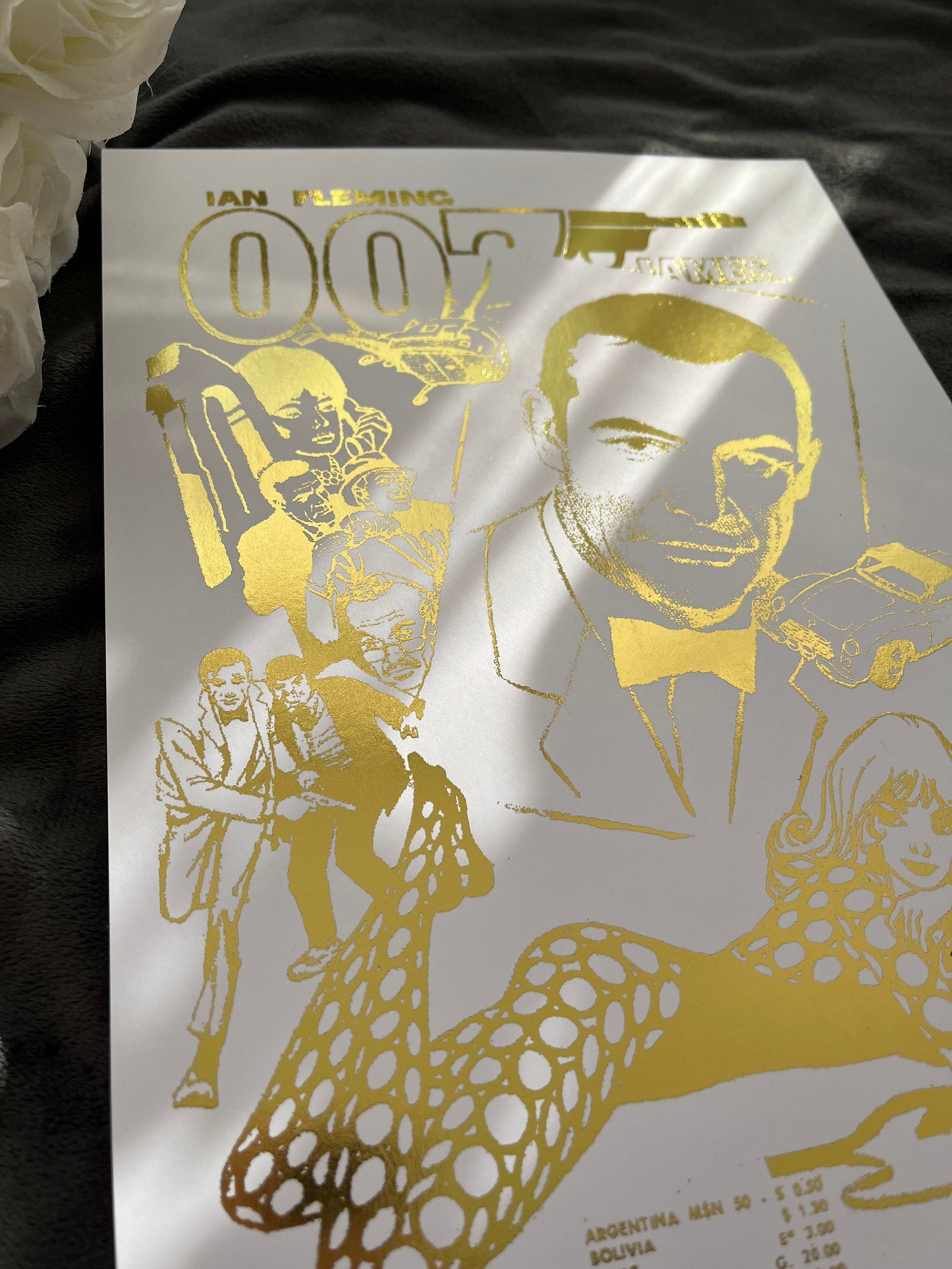 James Bond Foil Print featuring a comic cover with gold foil accents, showcasing the iconic spy in a vibrant design.