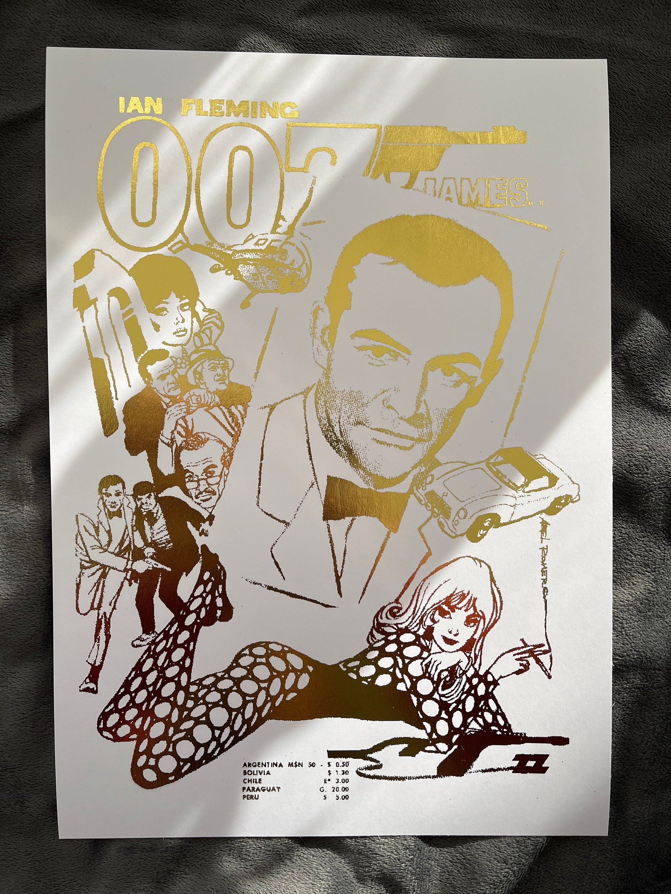 James Bond Foil Print featuring a comic cover with gold foil accents, showcasing the iconic spy in a vibrant design.