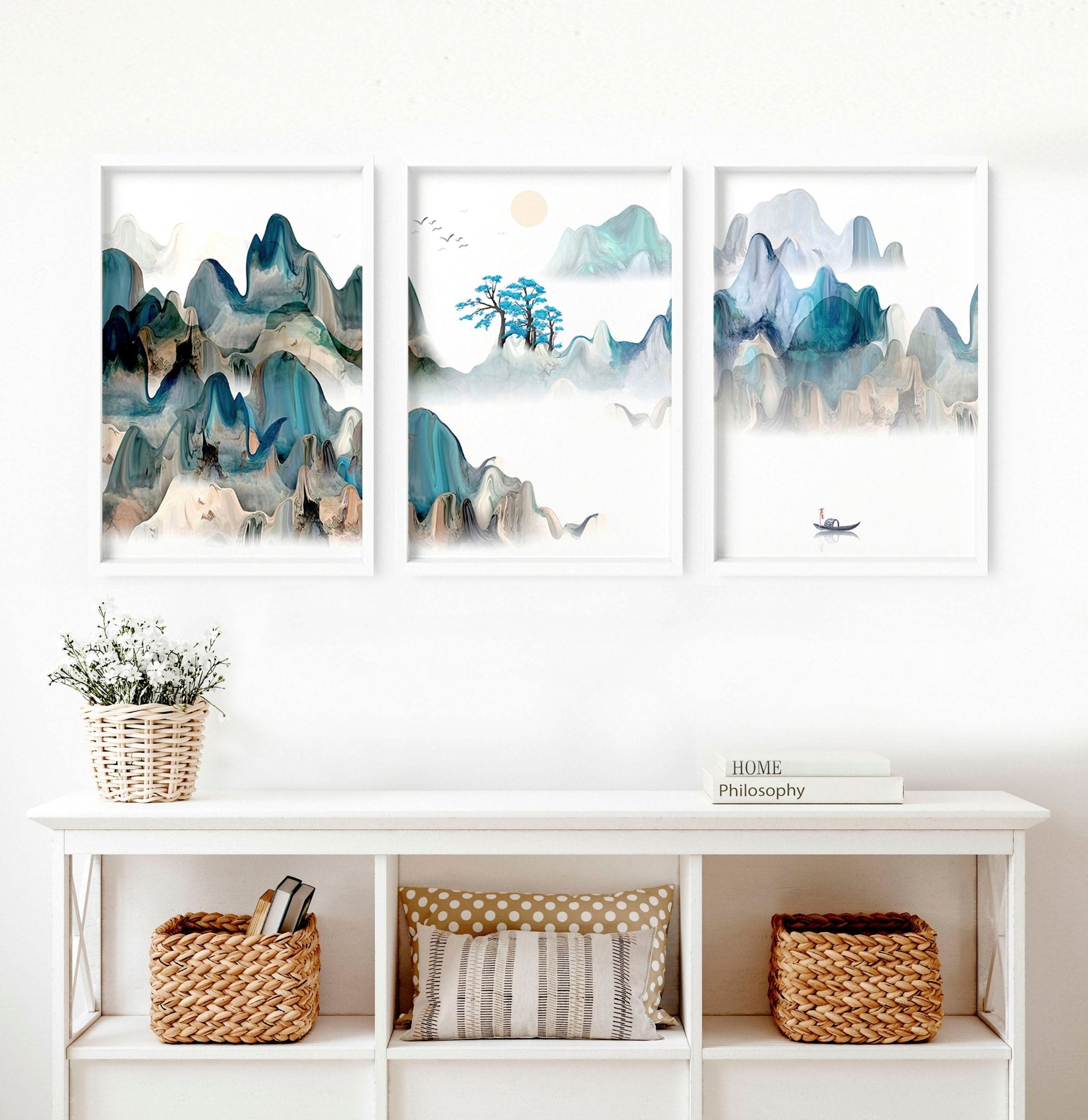 A serene set of three Japanese wall art prints featuring tranquil sunrise landscapes in teal and beige hues, perfect for living room decor.