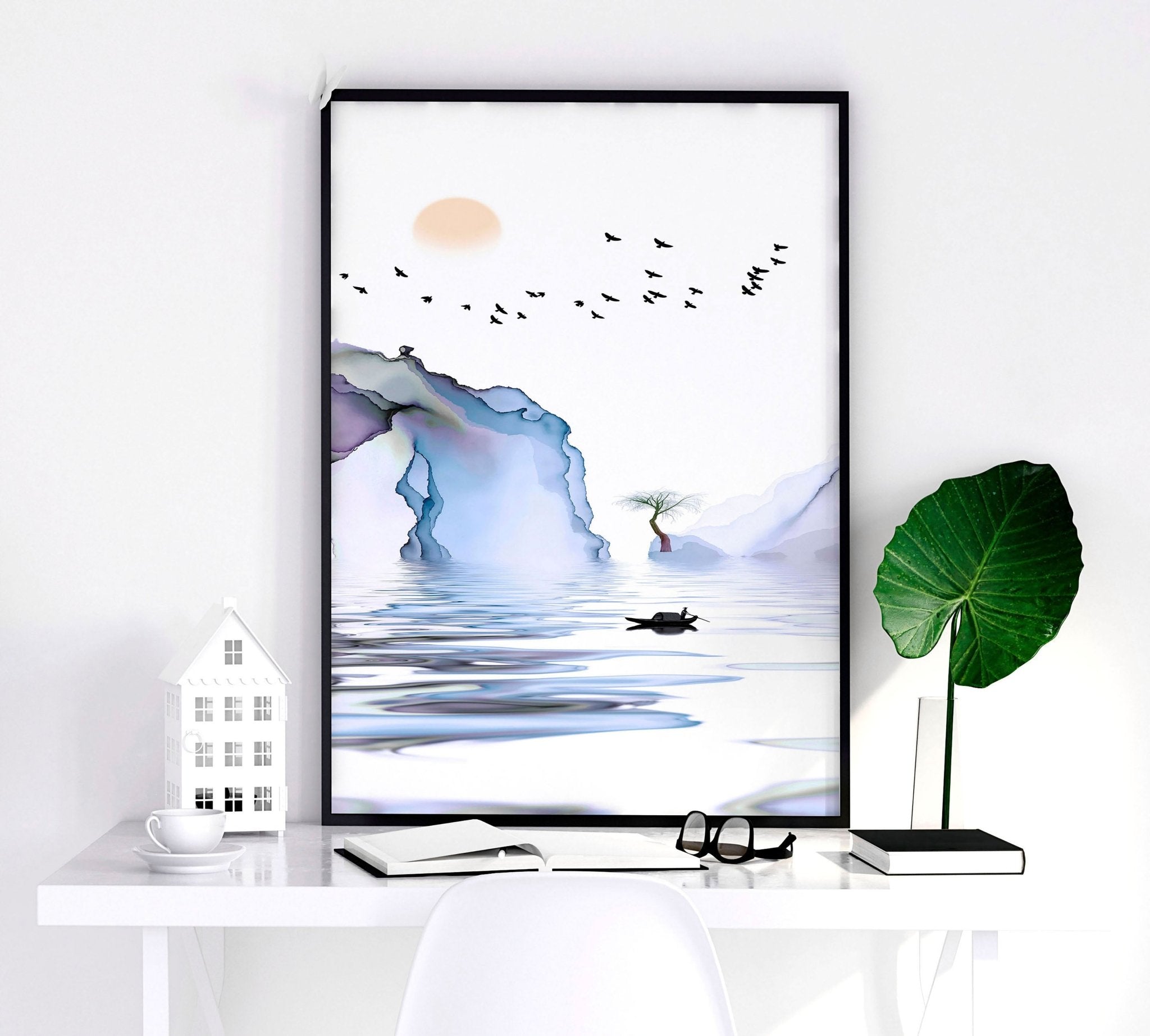 Set of 3 framed wall art prints featuring light blue ethereal Japanese landscapes, perfect for creating a serene bedroom atmosphere.