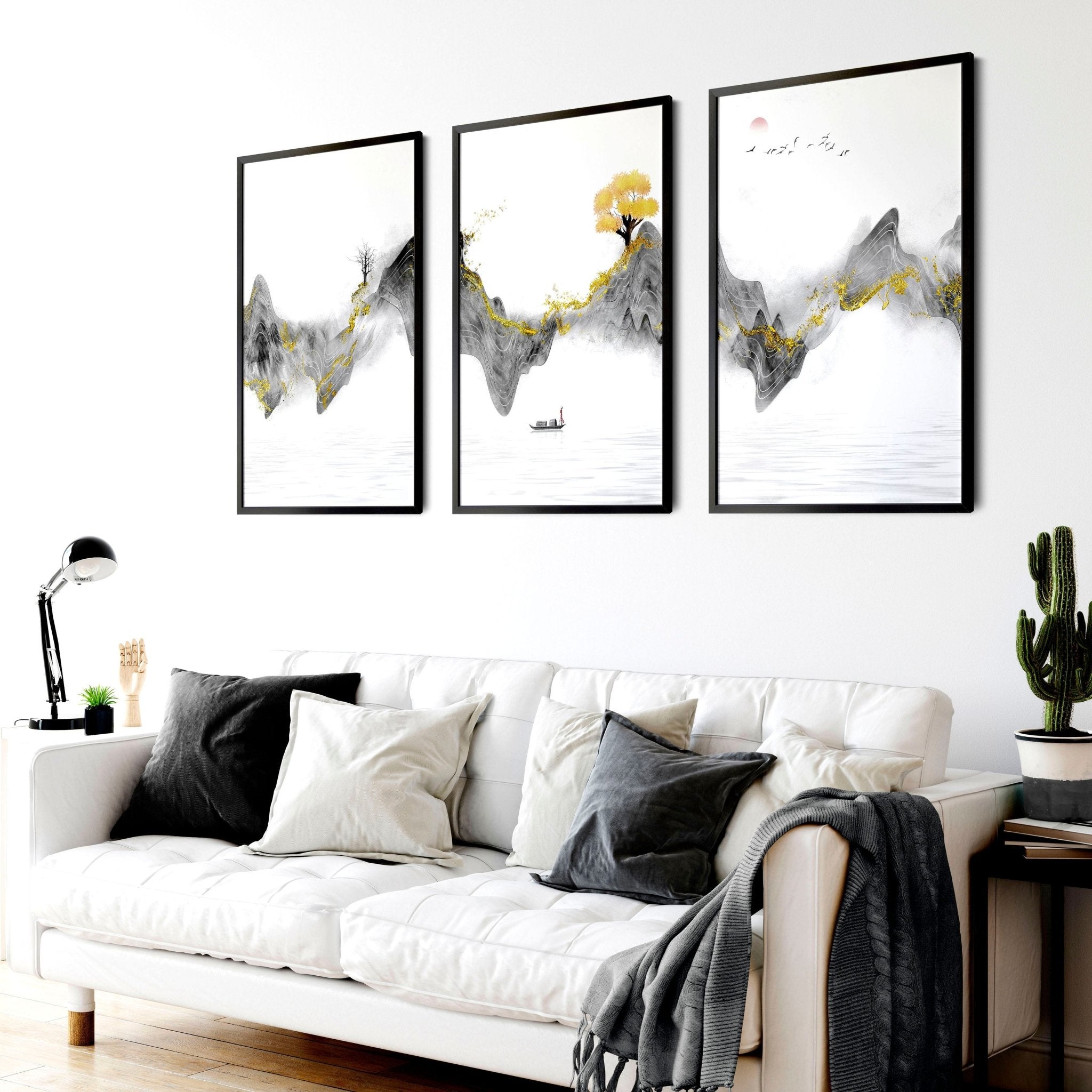 Set of 3 framed Japanese art prints featuring modern designs in grey and gold tones, elegantly displayed on a wall.