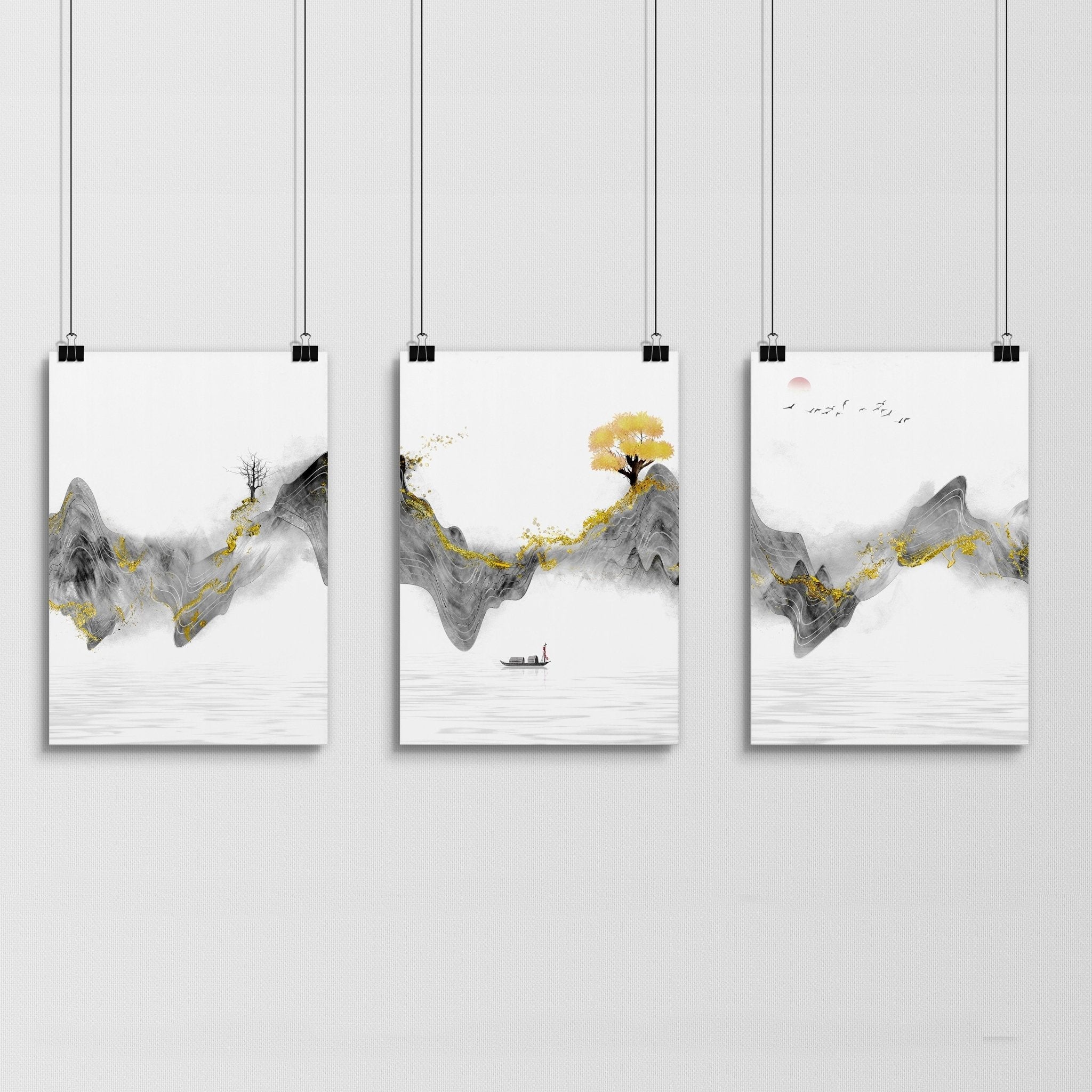 Set of 3 framed Japanese art prints featuring modern designs in grey and gold tones, elegantly displayed on a wall.