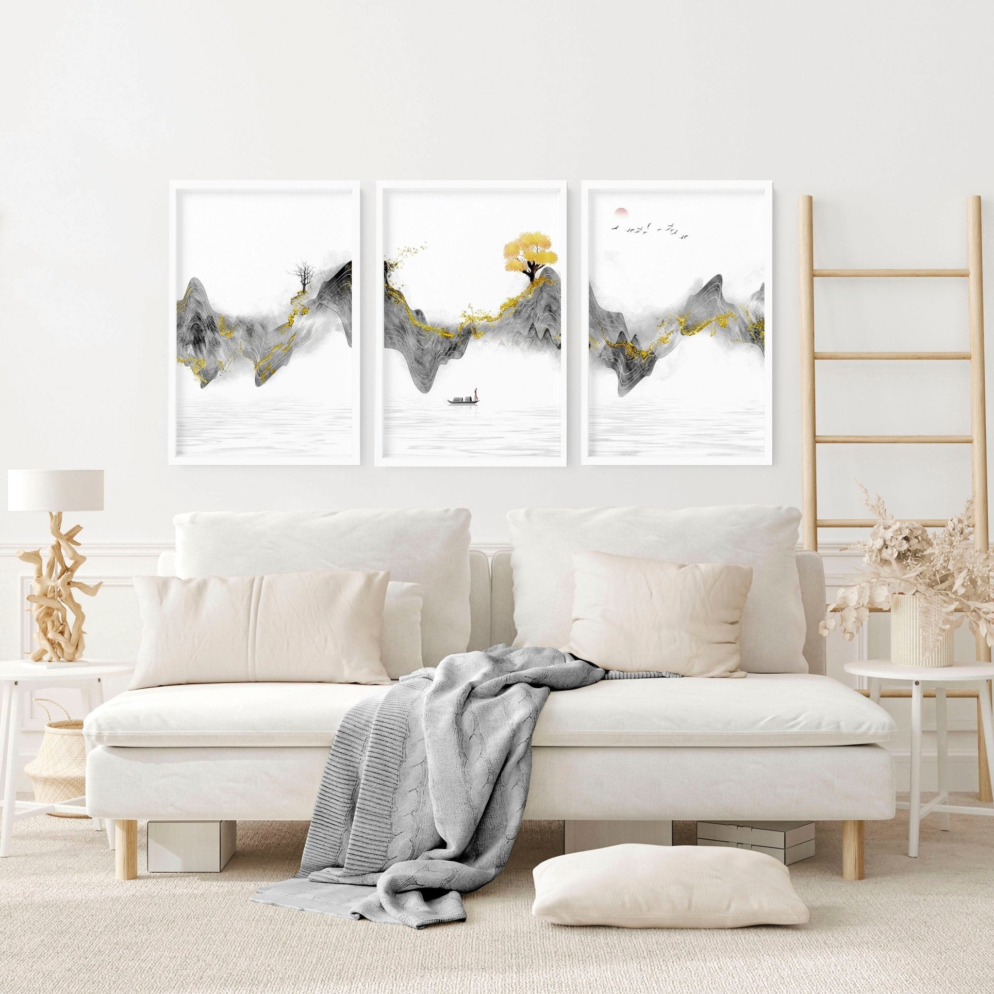 Set of 3 framed Japanese art prints featuring modern designs in grey and gold tones, elegantly displayed on a wall.