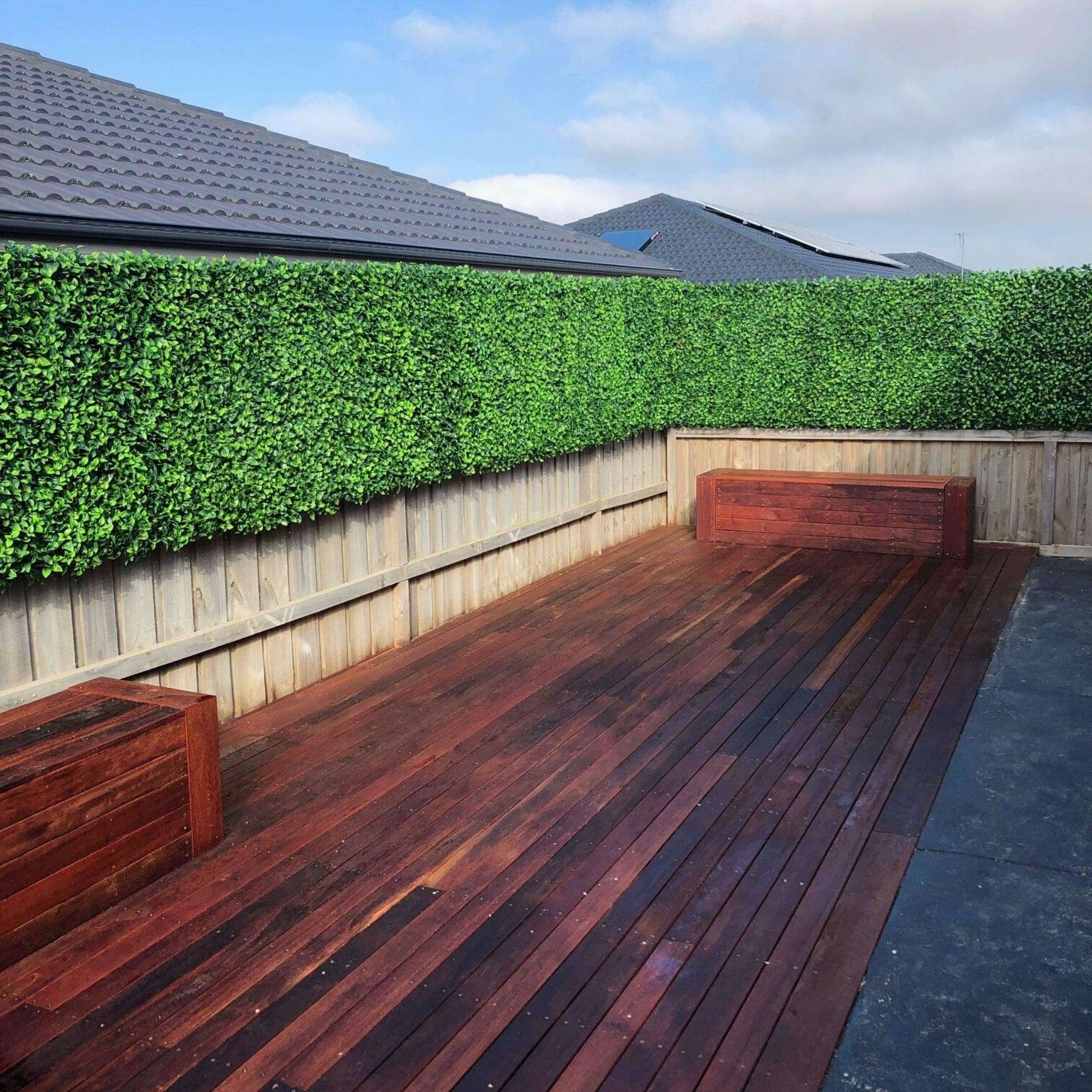 Jasmine Artificial Hedge Screen, a lush green wall panel, showcasing realistic foliage for indoor and outdoor use.