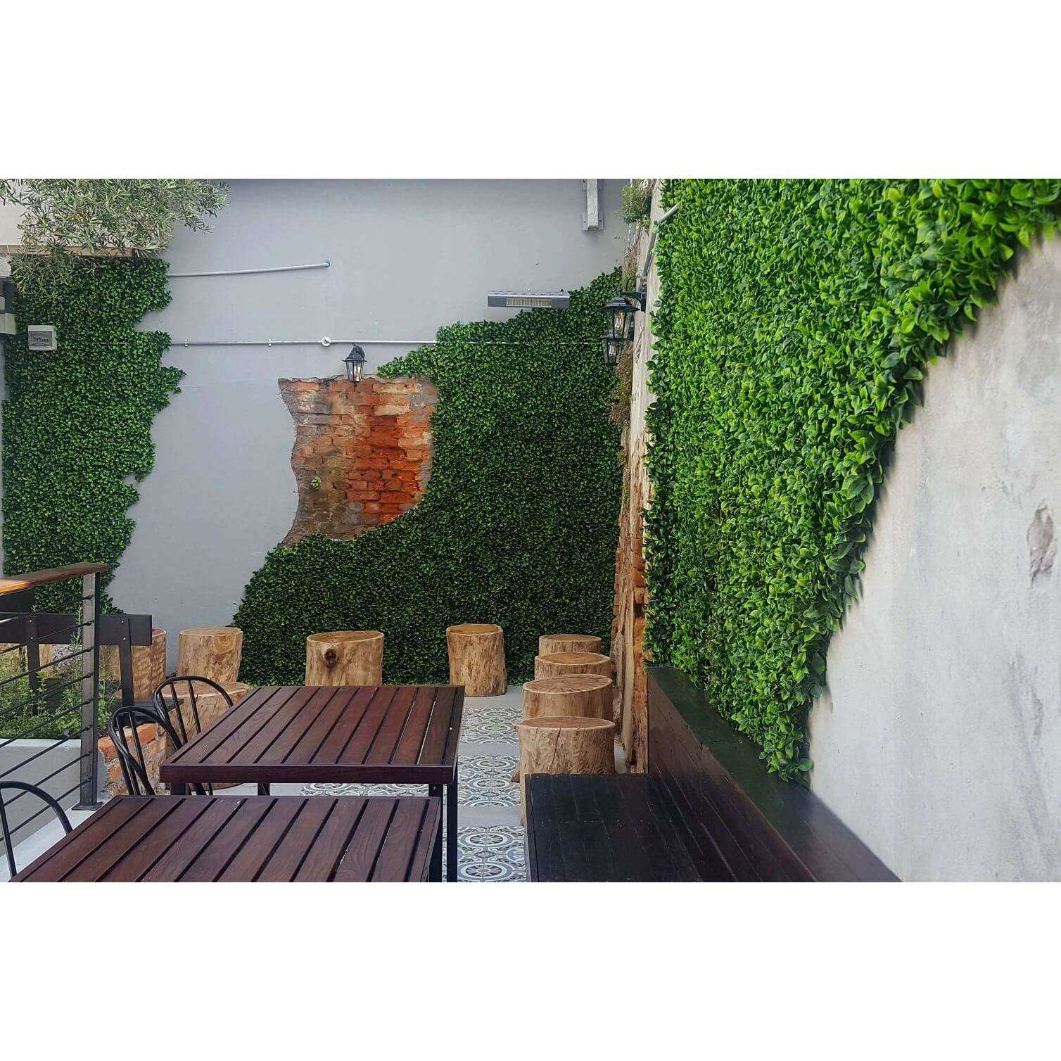 Jasmine Artificial Hedge Screen, a lush green wall panel, showcasing realistic foliage for indoor and outdoor use.