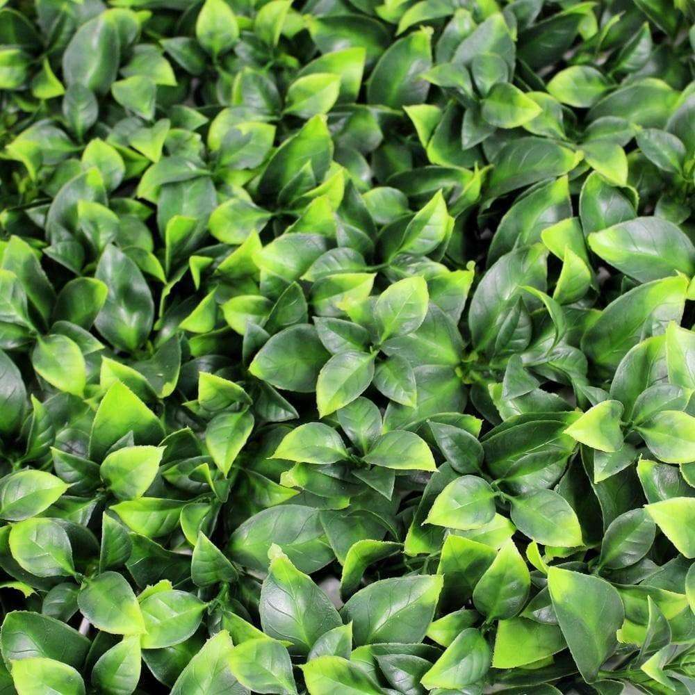 Jasmine Artificial Hedge Screen, a lush green wall panel, showcasing realistic foliage for indoor and outdoor use.