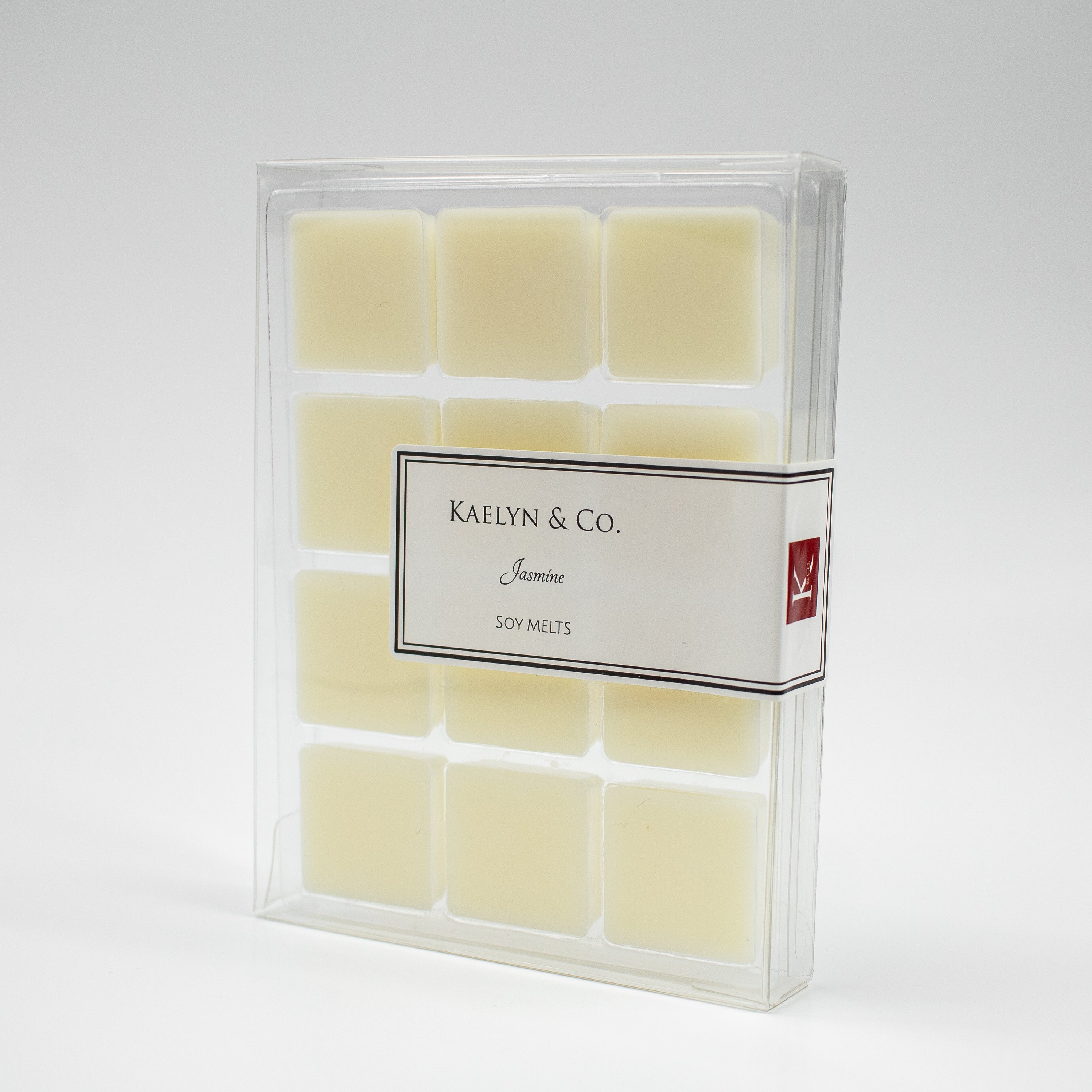 A pack of Jasmine Soy Wax Melts featuring twelve cubes, showcasing a floral scent blend of jasmine and honeysuckle.