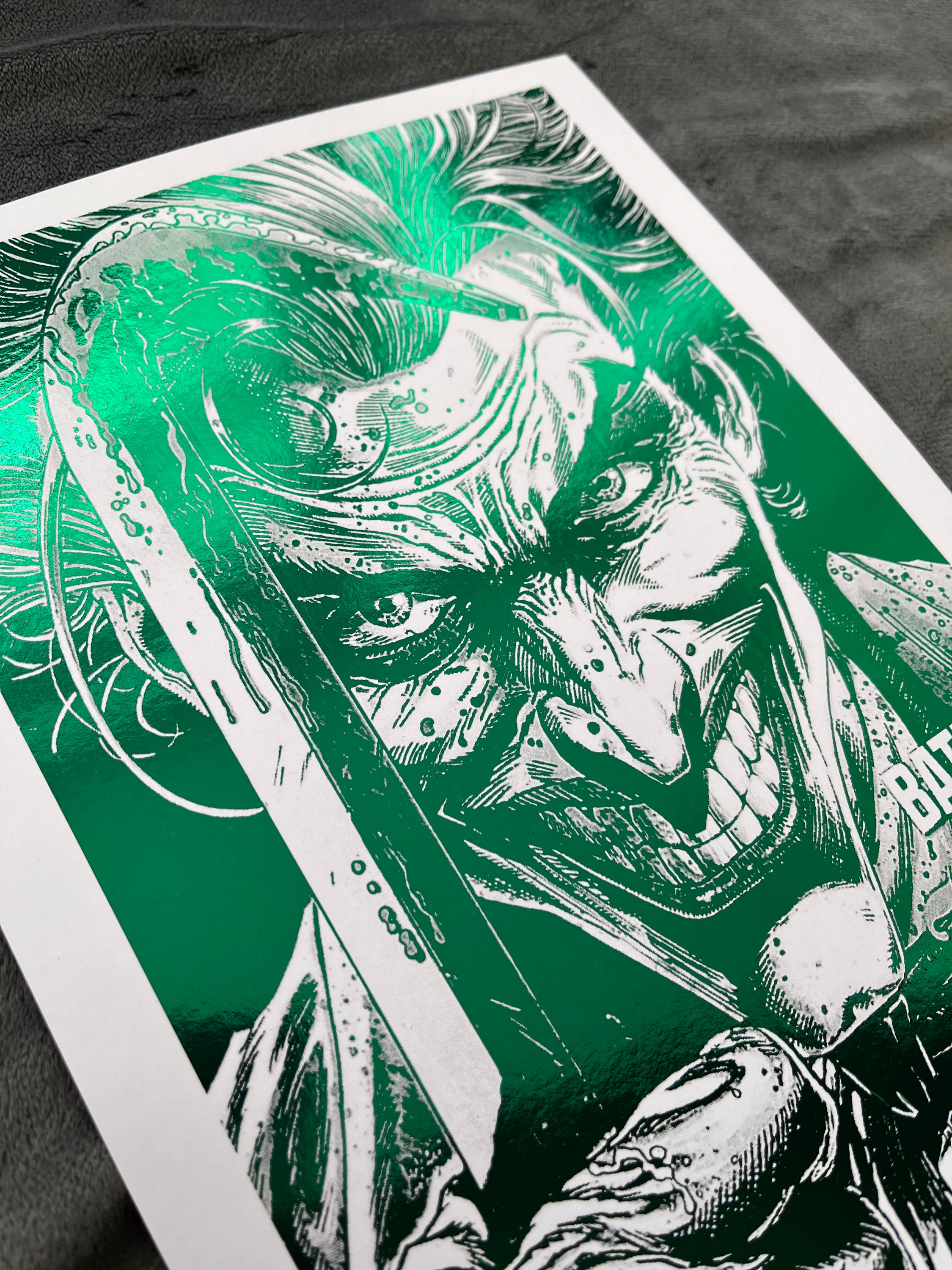 Vibrant green Joker foil print featuring the Clown Prince of Crime with an iconic smile.