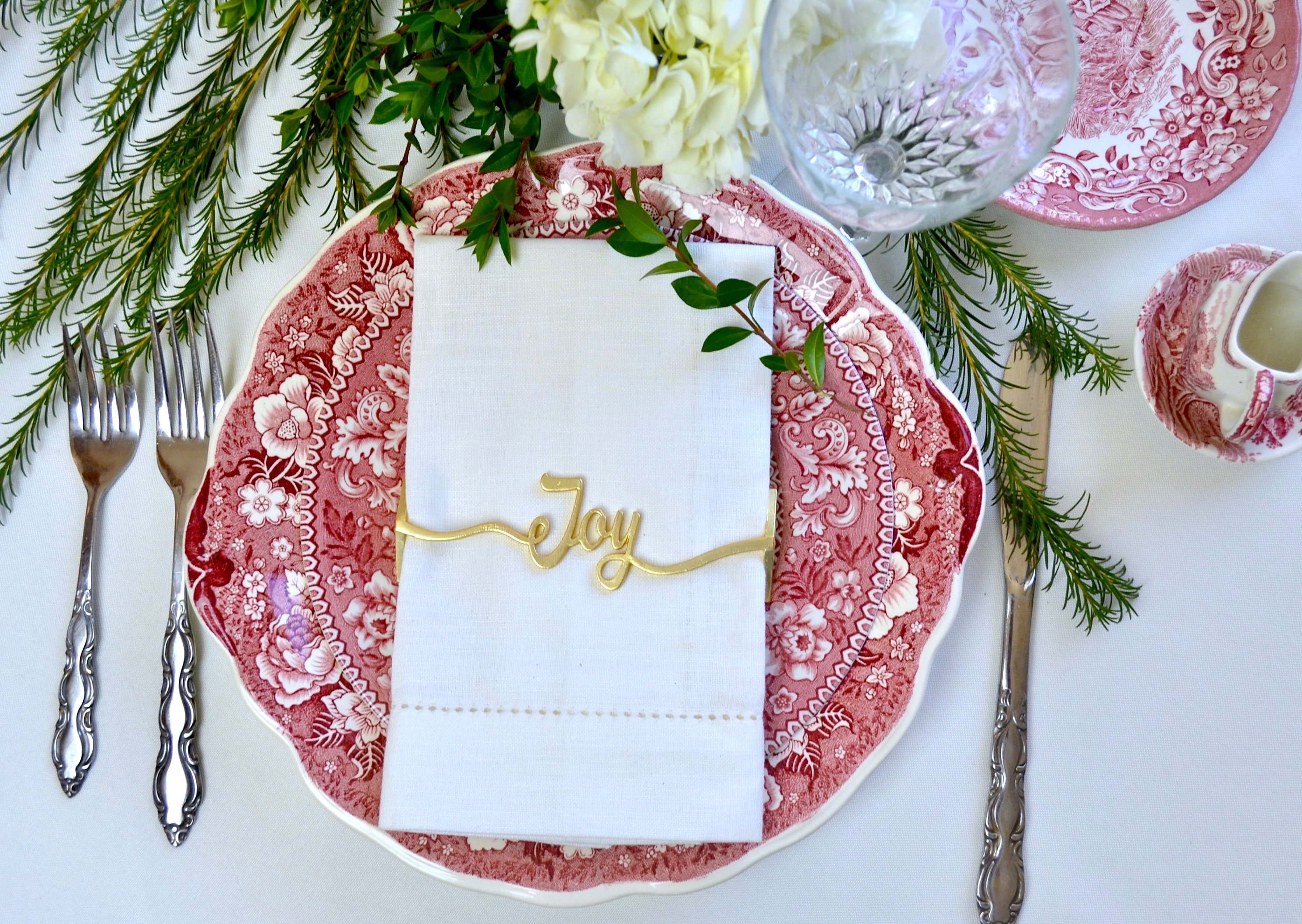 Joy Napkin Wrap in Matte Gold, elegantly designed for stylish dining decor.