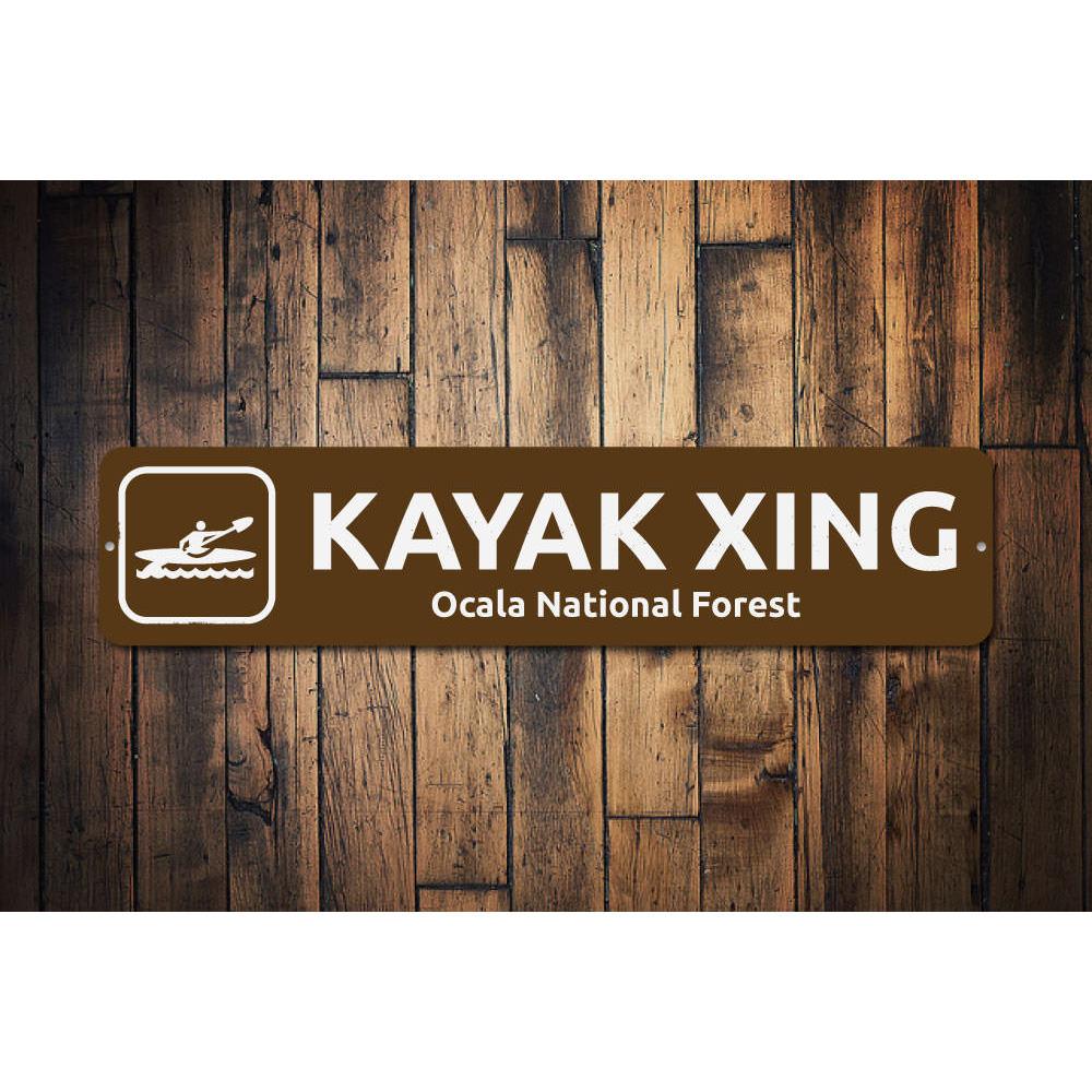 Kayak Crossing Sign made of durable aluminum, featuring a vibrant design suitable for indoor and outdoor decor.