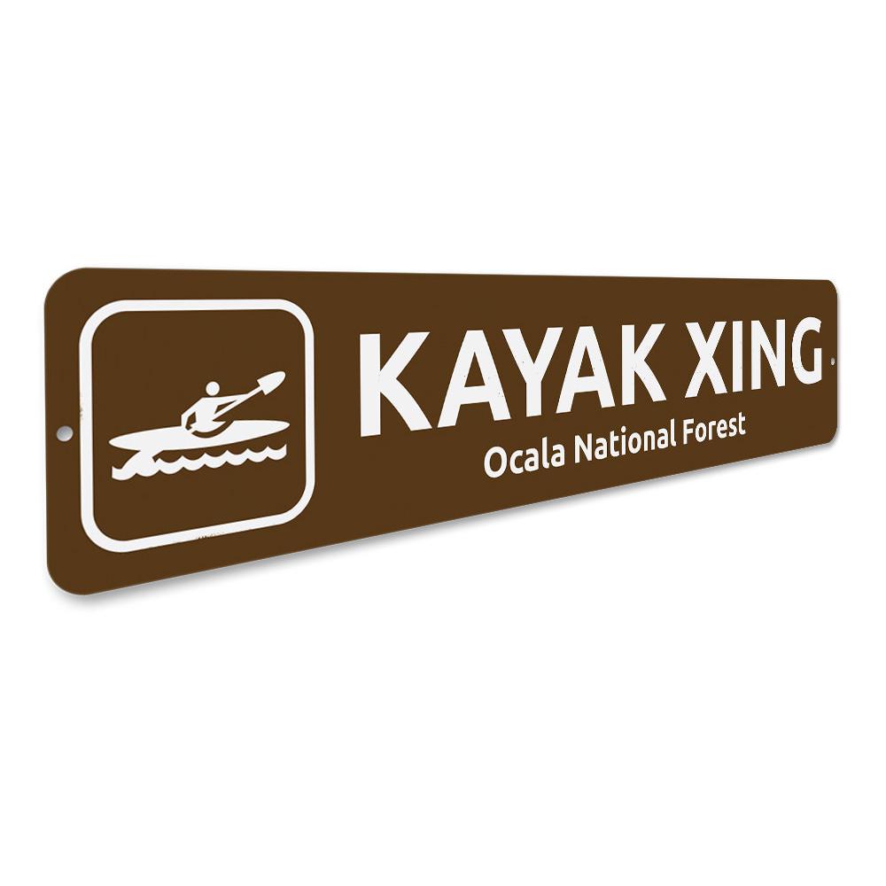 Kayak Crossing Sign made of durable aluminum, featuring a vibrant design suitable for indoor and outdoor decor.