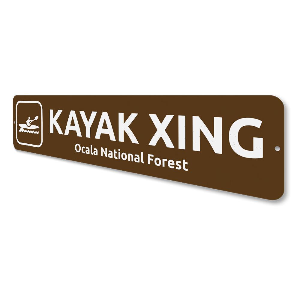 Kayak Crossing Sign made of durable aluminum, featuring a vibrant design suitable for indoor and outdoor decor.