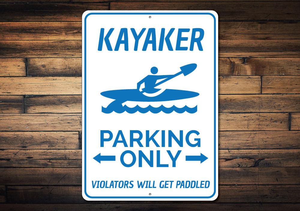 A vibrant Kayaker Parking Sign made of durable aluminum, featuring a kayak graphic and customizable text options, perfect for outdoor enthusiasts.