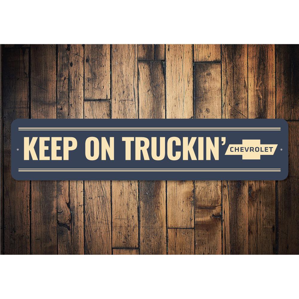 Keep on Truckin Chevy Sign made of high-quality aluminum, featuring vibrant colors and customizable text, perfect for home decor.