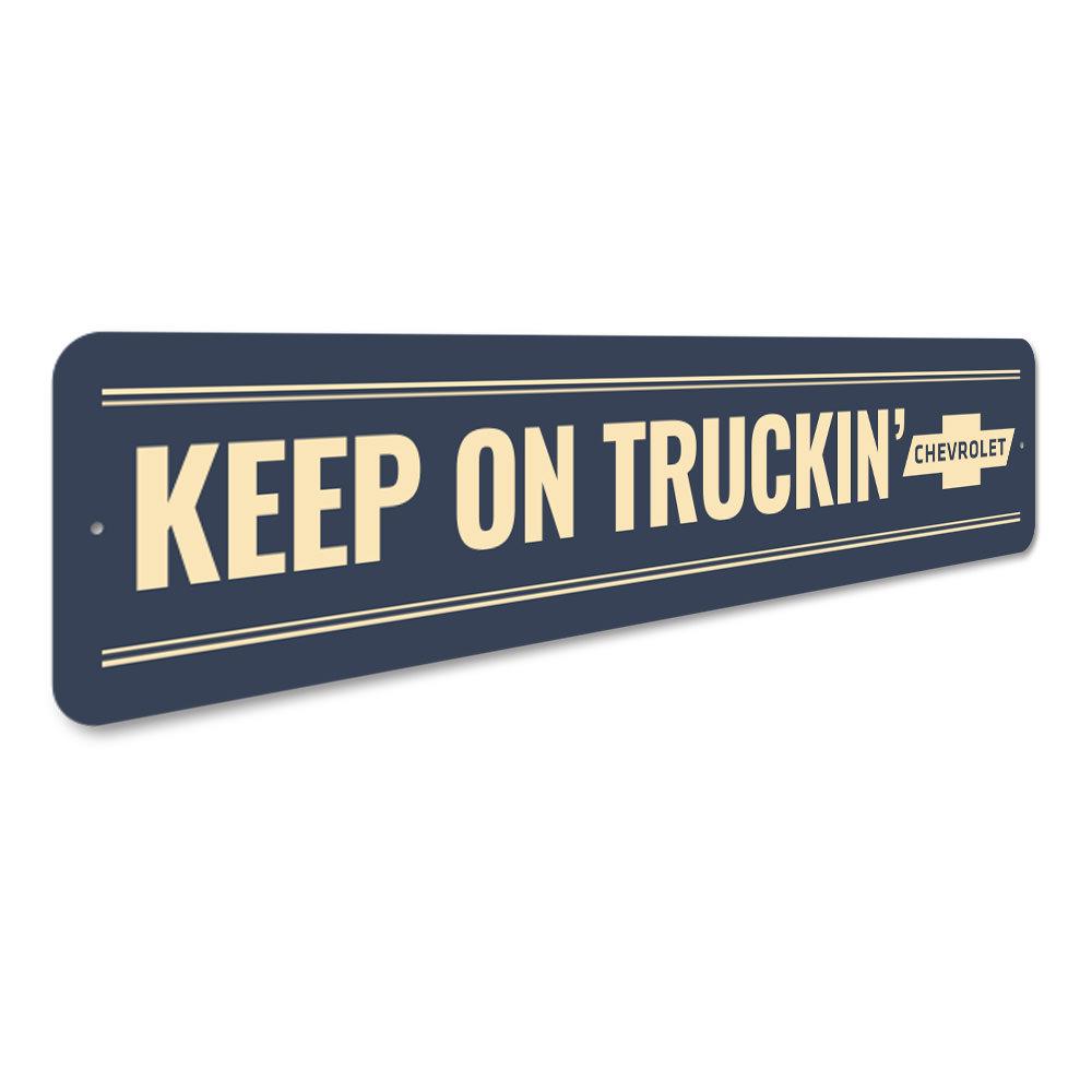 Keep on Truckin Chevy Sign made of high-quality aluminum, featuring vibrant colors and customizable text, perfect for home decor.