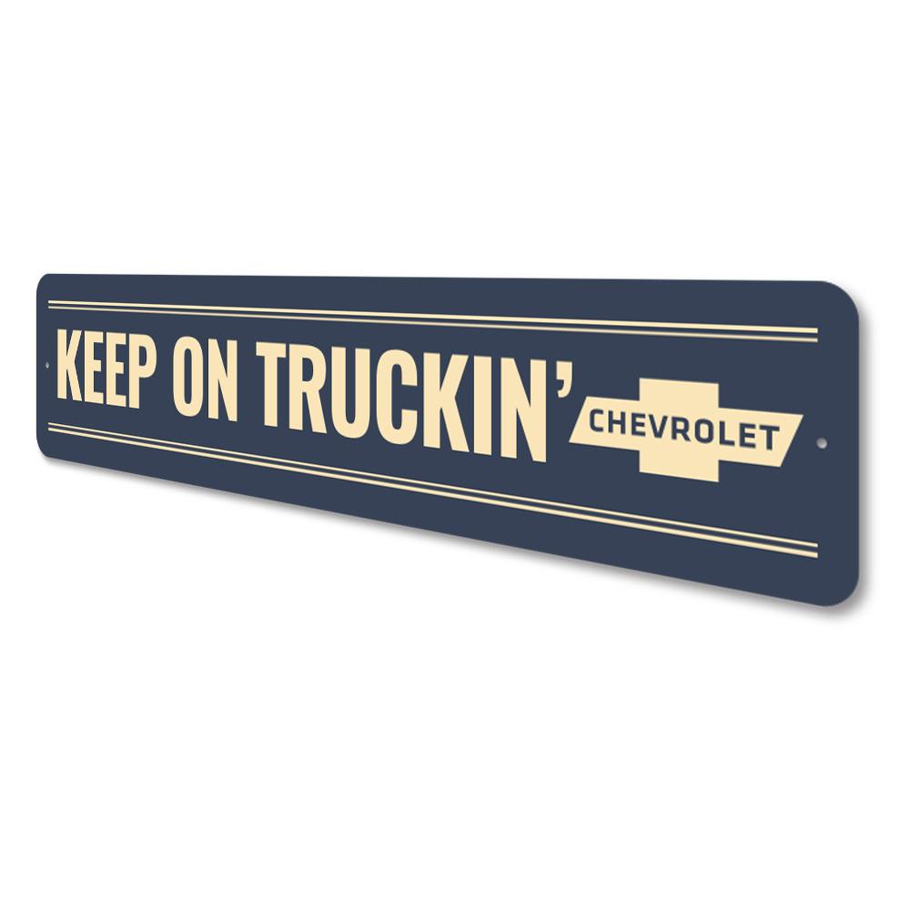 Keep on Truckin Chevy Sign made of high-quality aluminum, featuring vibrant colors and customizable text, perfect for home decor.