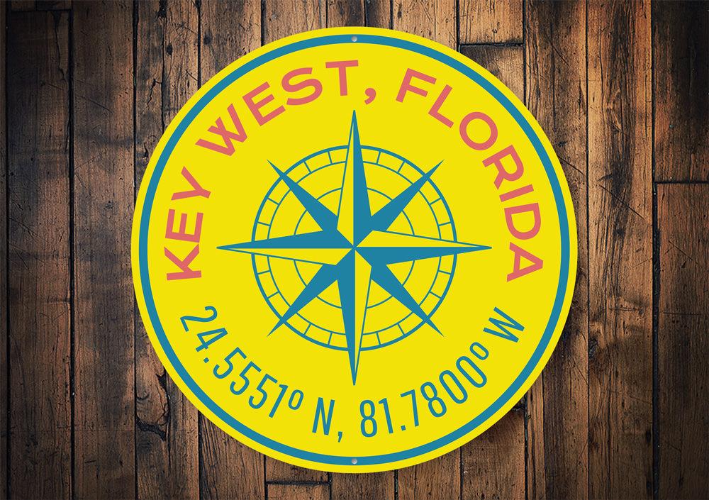 Key West Compass Sign featuring nautical design, made from high-quality aluminum, perfect for coastal decor.